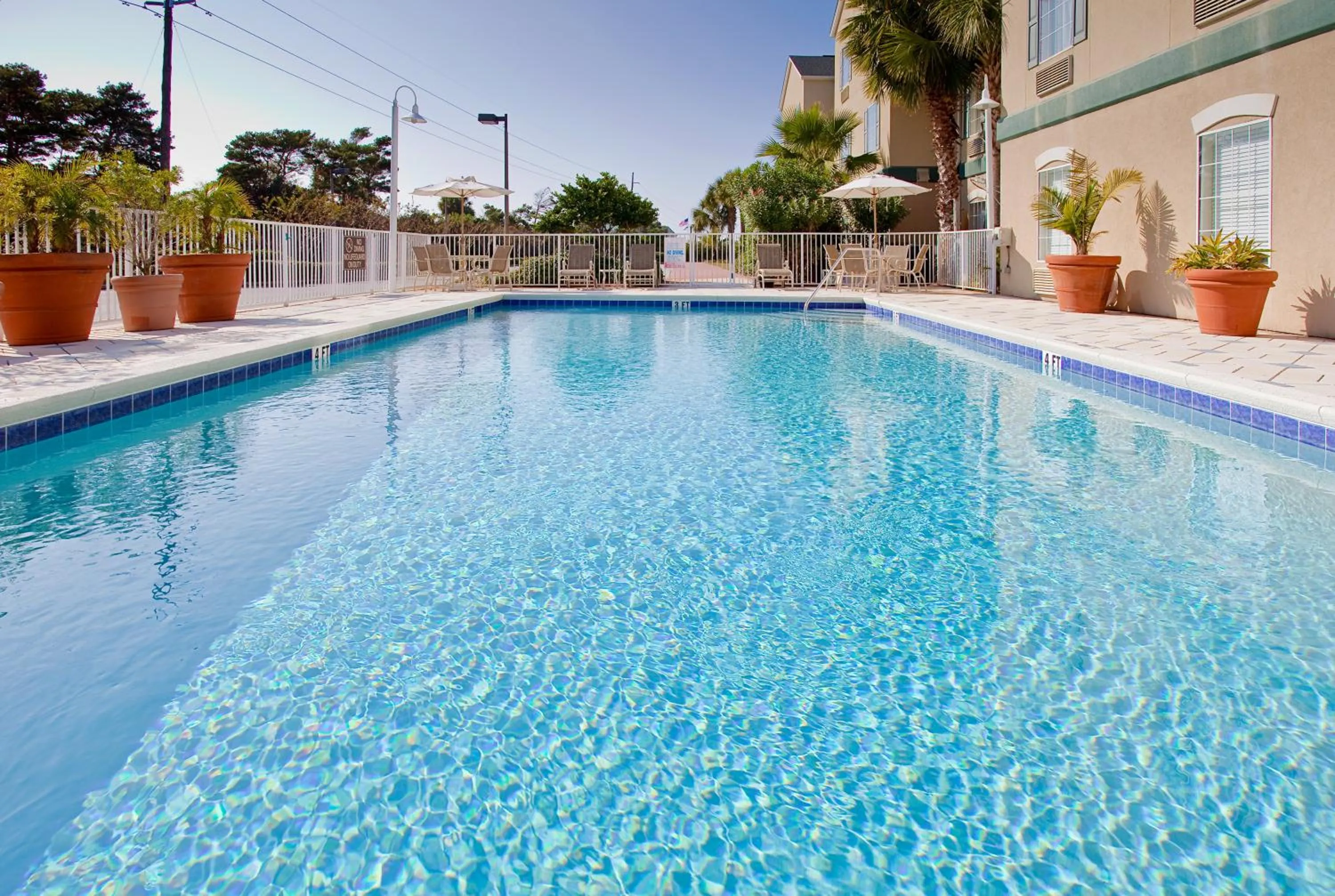 Swimming pool in Holiday Inn Express Destin E - Commons Mall Area by IHG
