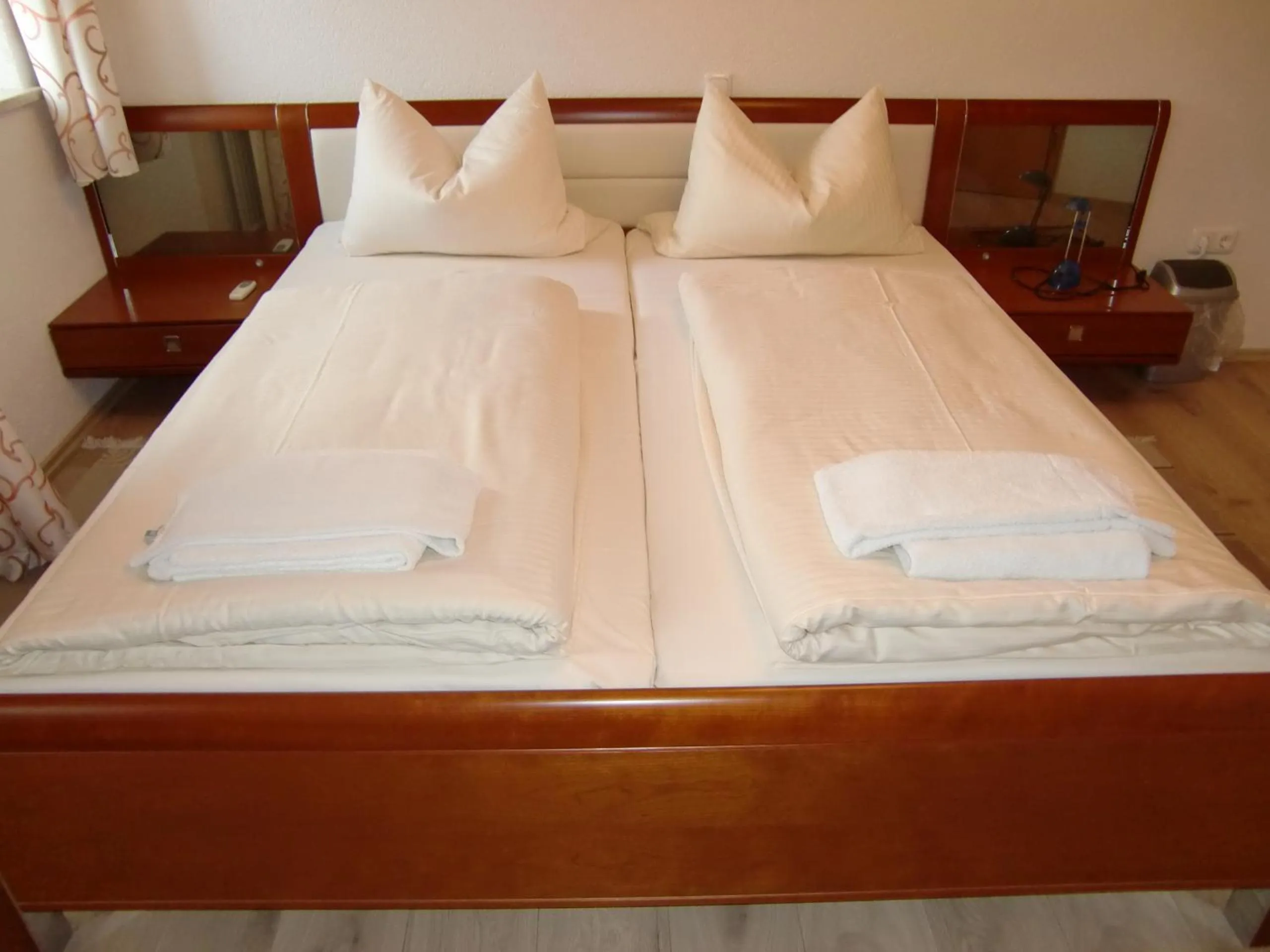 Photo of the whole room, Bed in Landhotel Fuchsbau