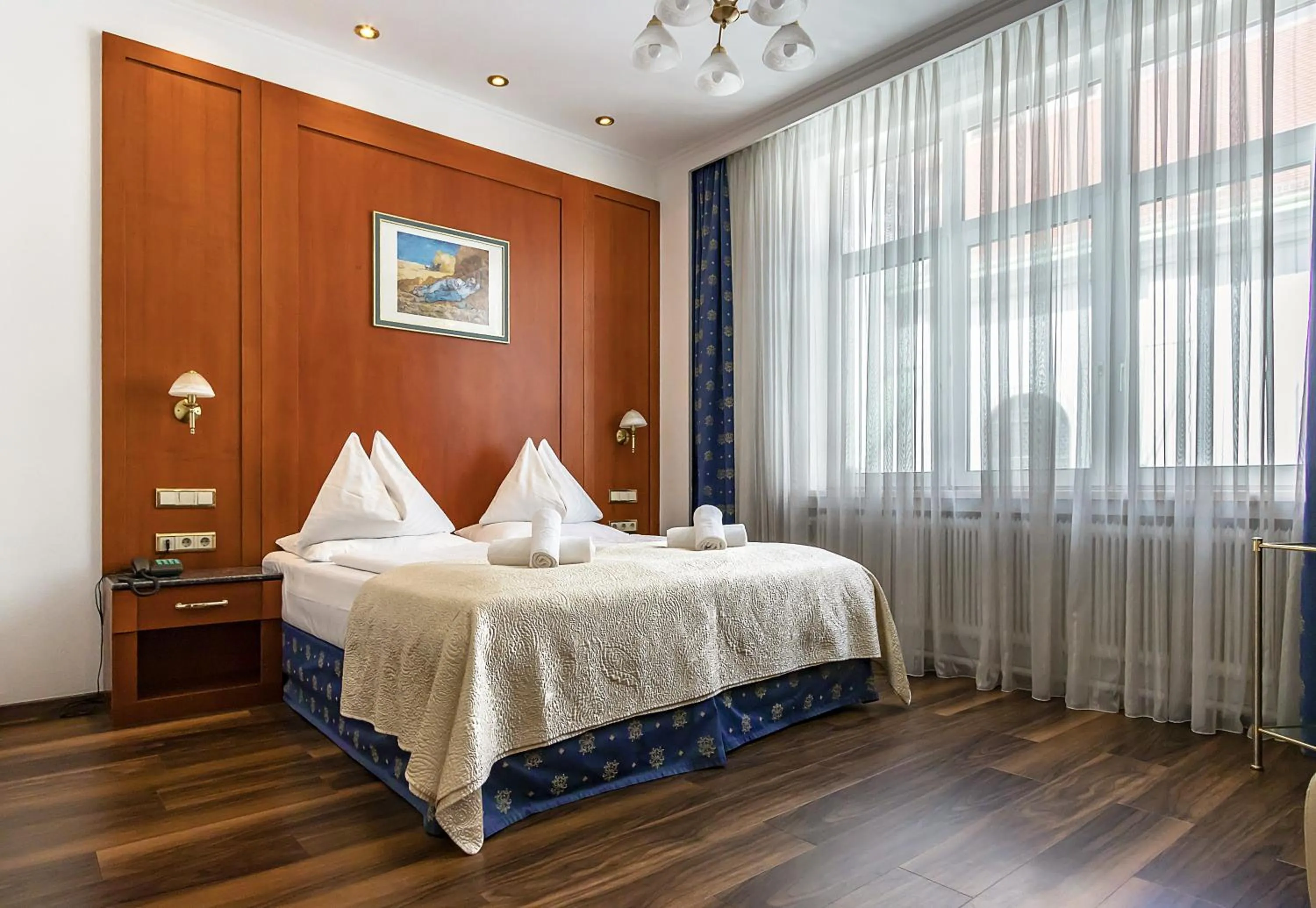 Bed in Hotel Corvinus Vienna