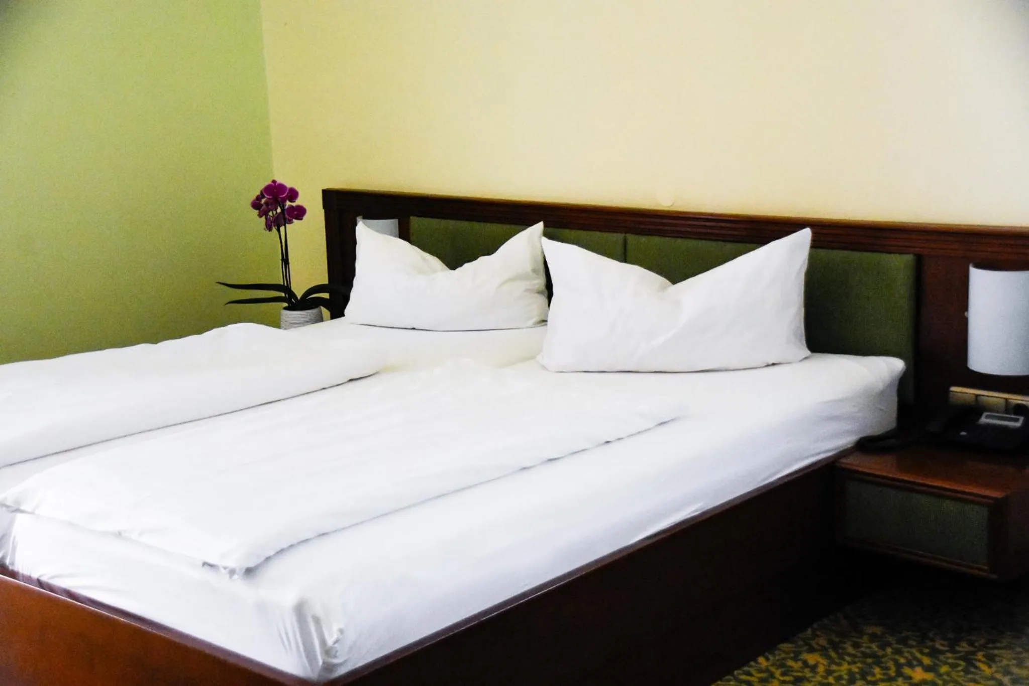 Bed in Parkhotel Zirndorf