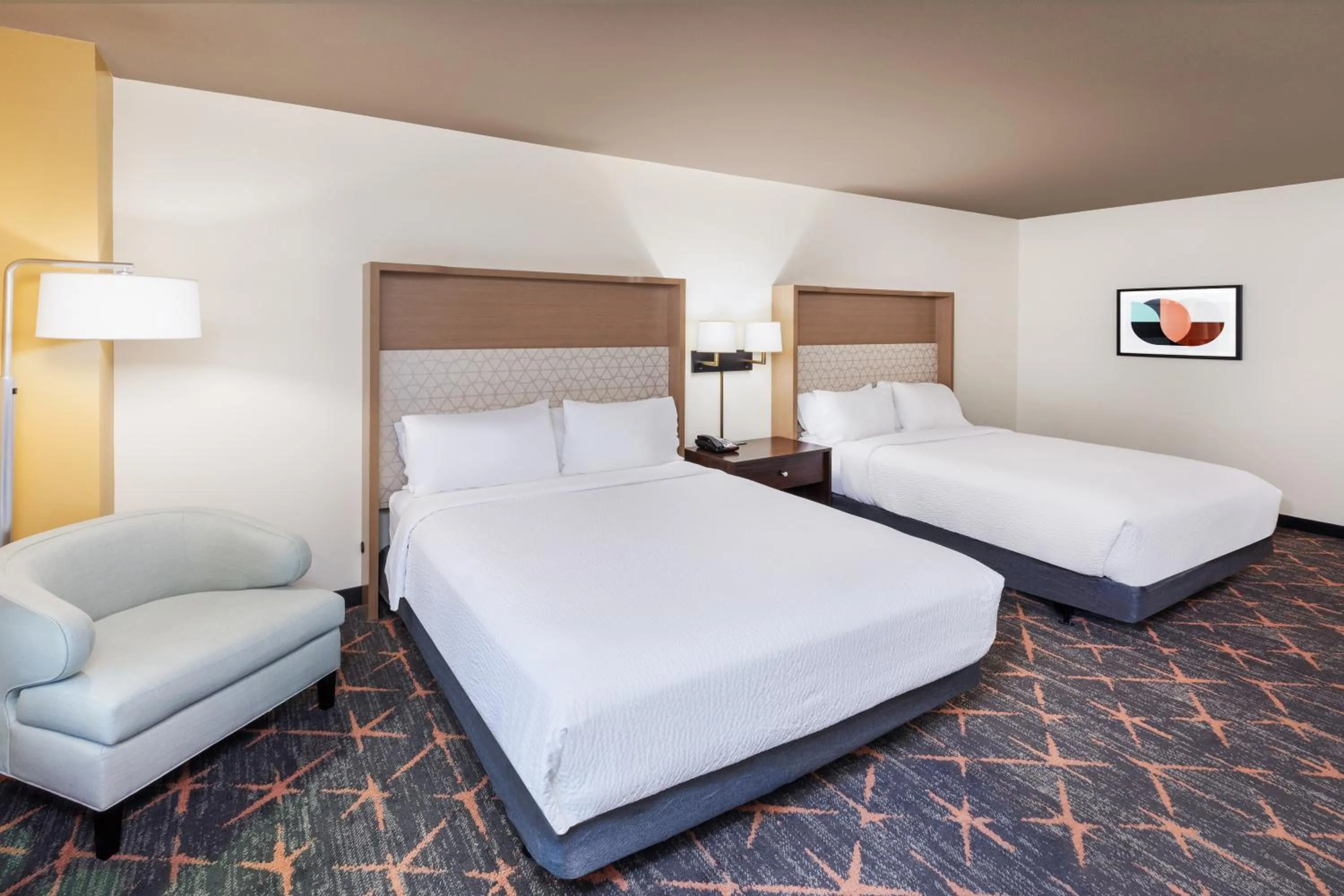 Bedroom, Bed in Holiday Inn Hotel & Suites Tulsa South by IHG