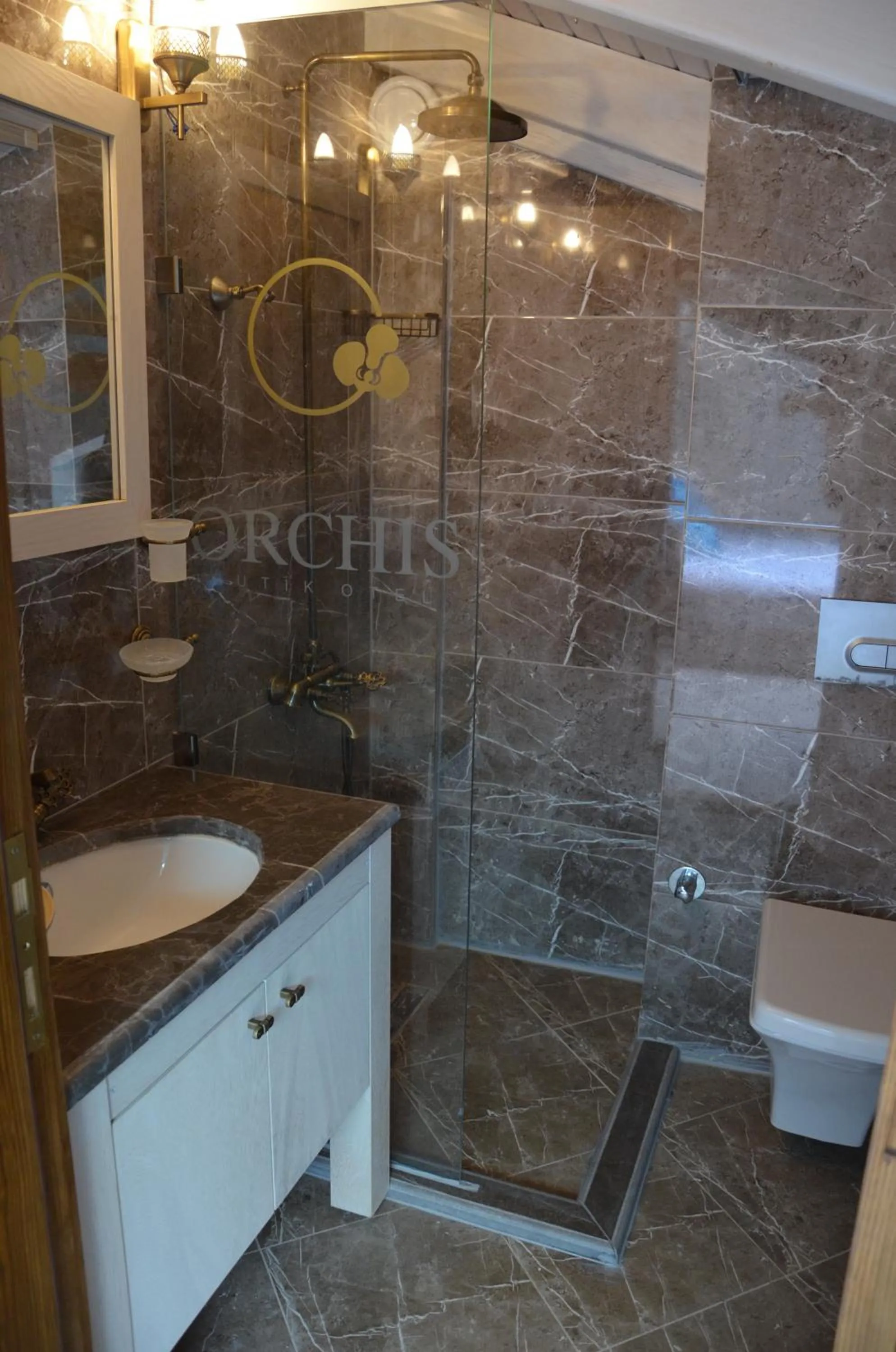 Bathroom in Orchis Hotel