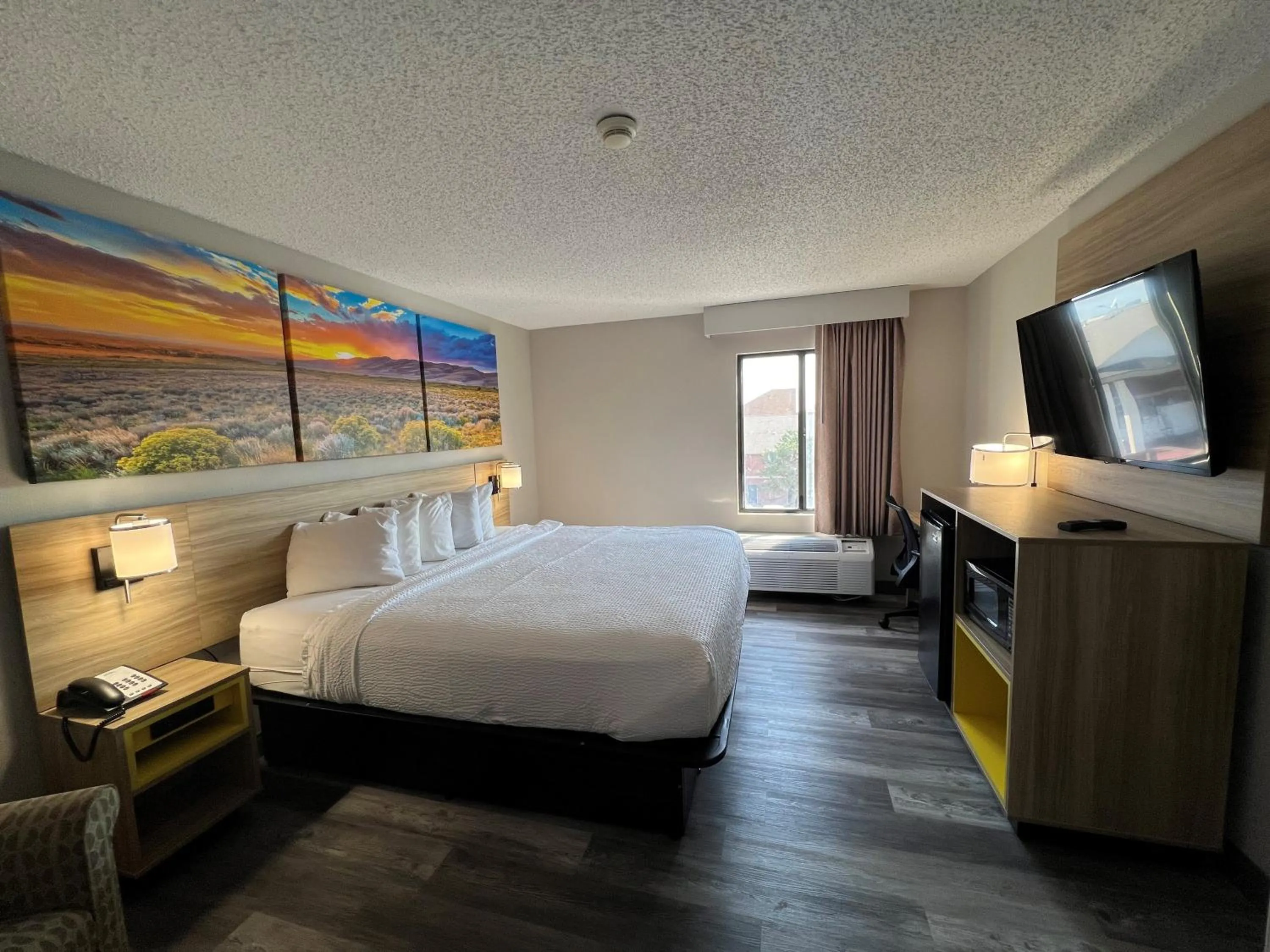 Bed in Days Inn by Wyndham Tulsa Central