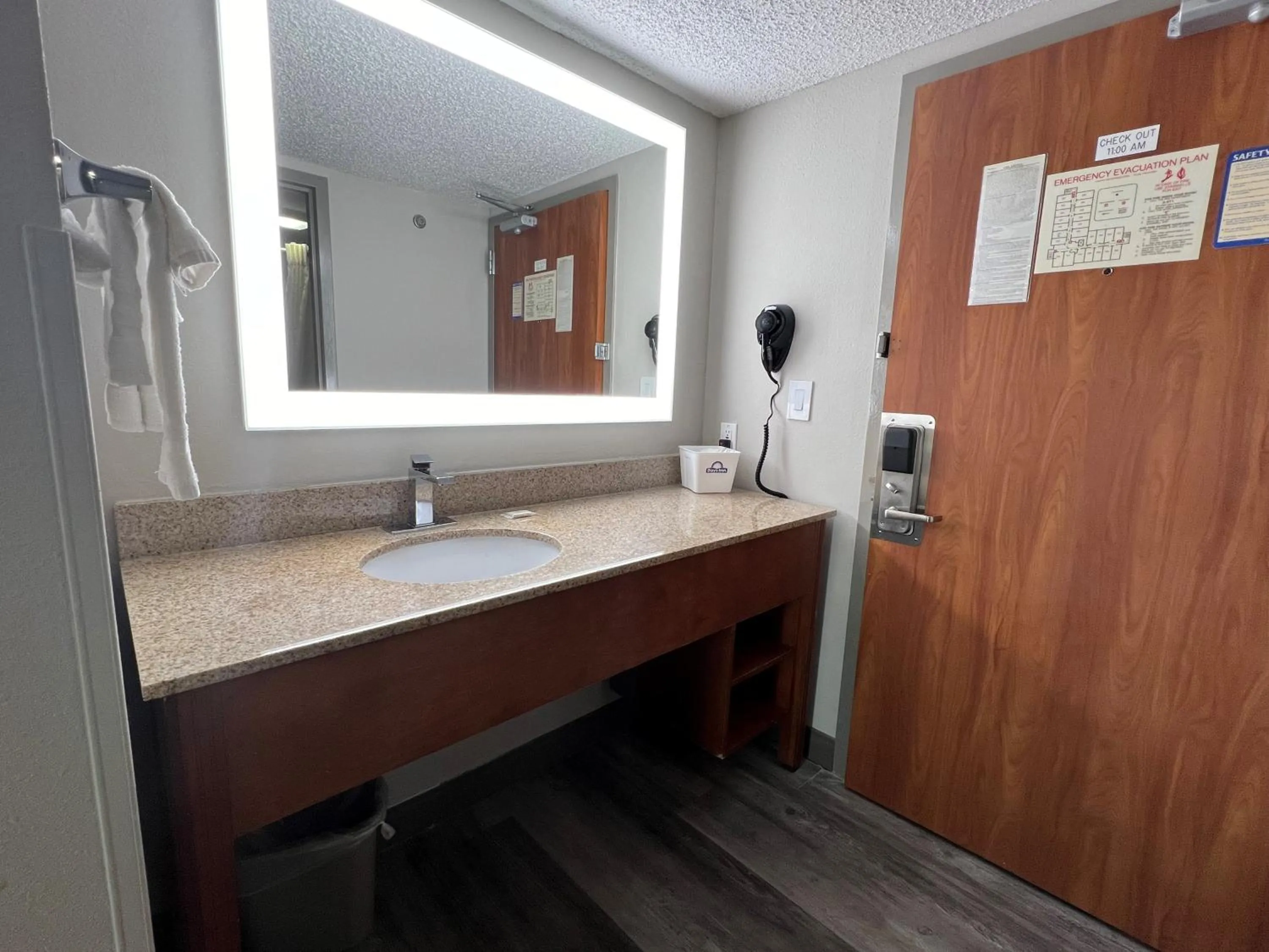Bathroom in Days Inn by Wyndham Tulsa Central