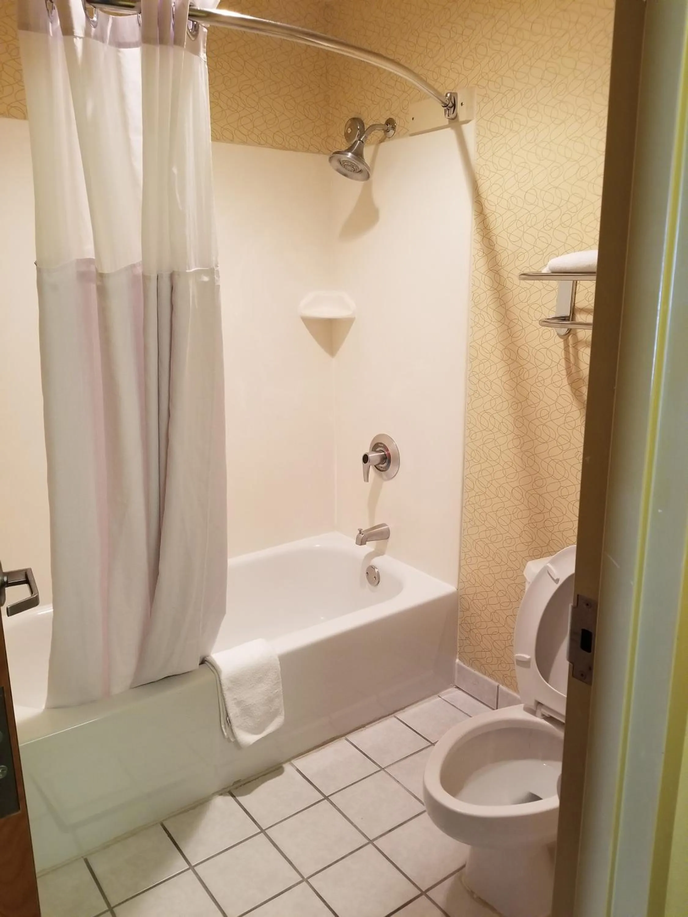 Toilet in Days Inn by Wyndham Tulsa Central