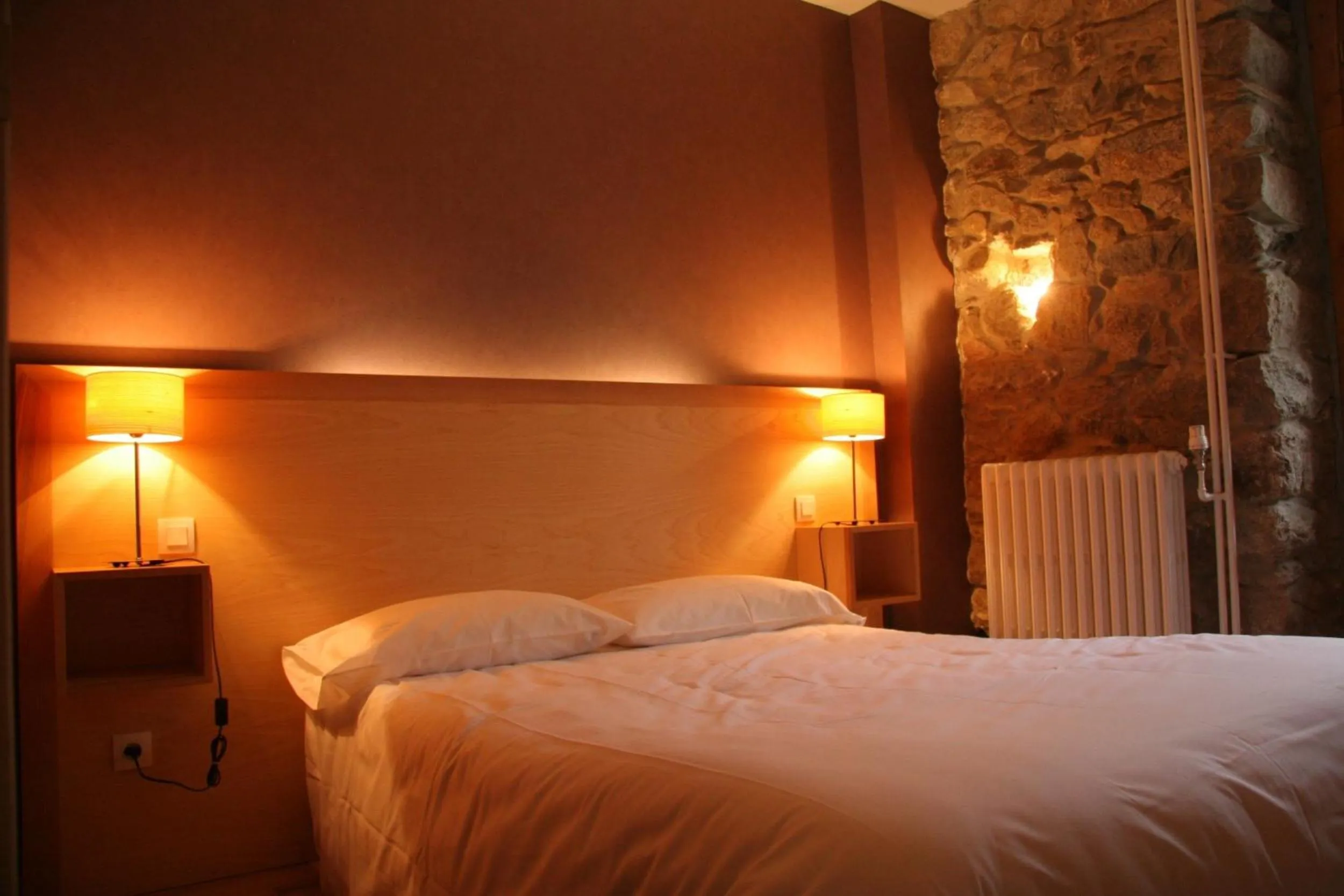 Bed in Hôtel Le Chalet