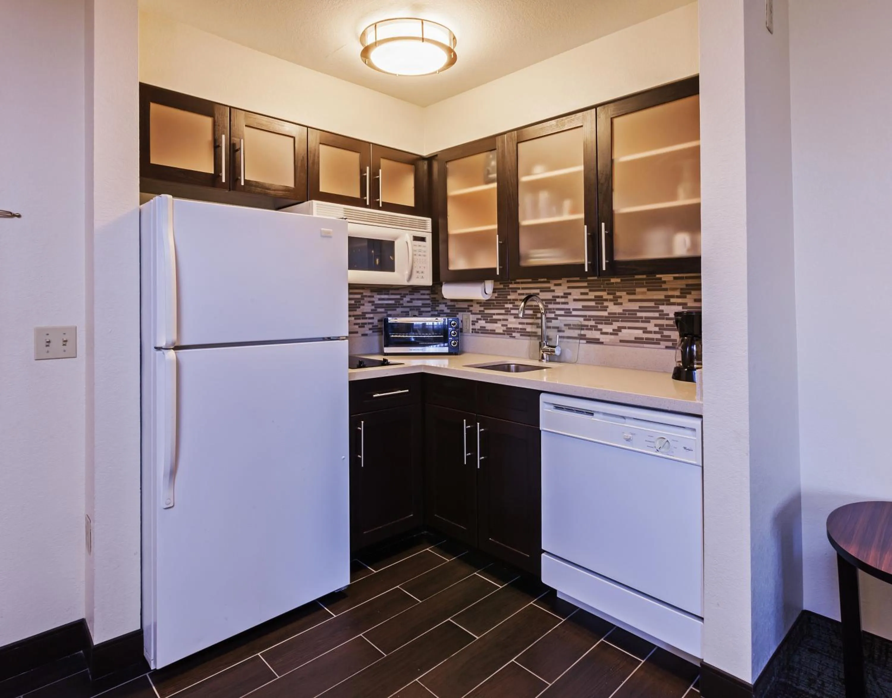 Kitchen or kitchenette in Staybridge Suites Tulsa-Woodland Hills, an IHG Hotel