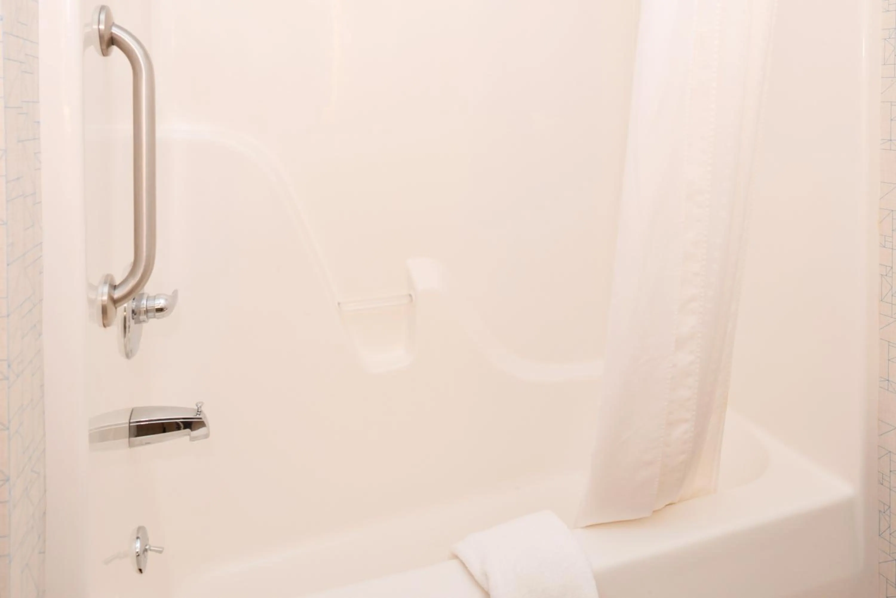 Bathroom in Holiday Inn Express Hotel & Suites Urbana-Champaign-U of I Area by IHG