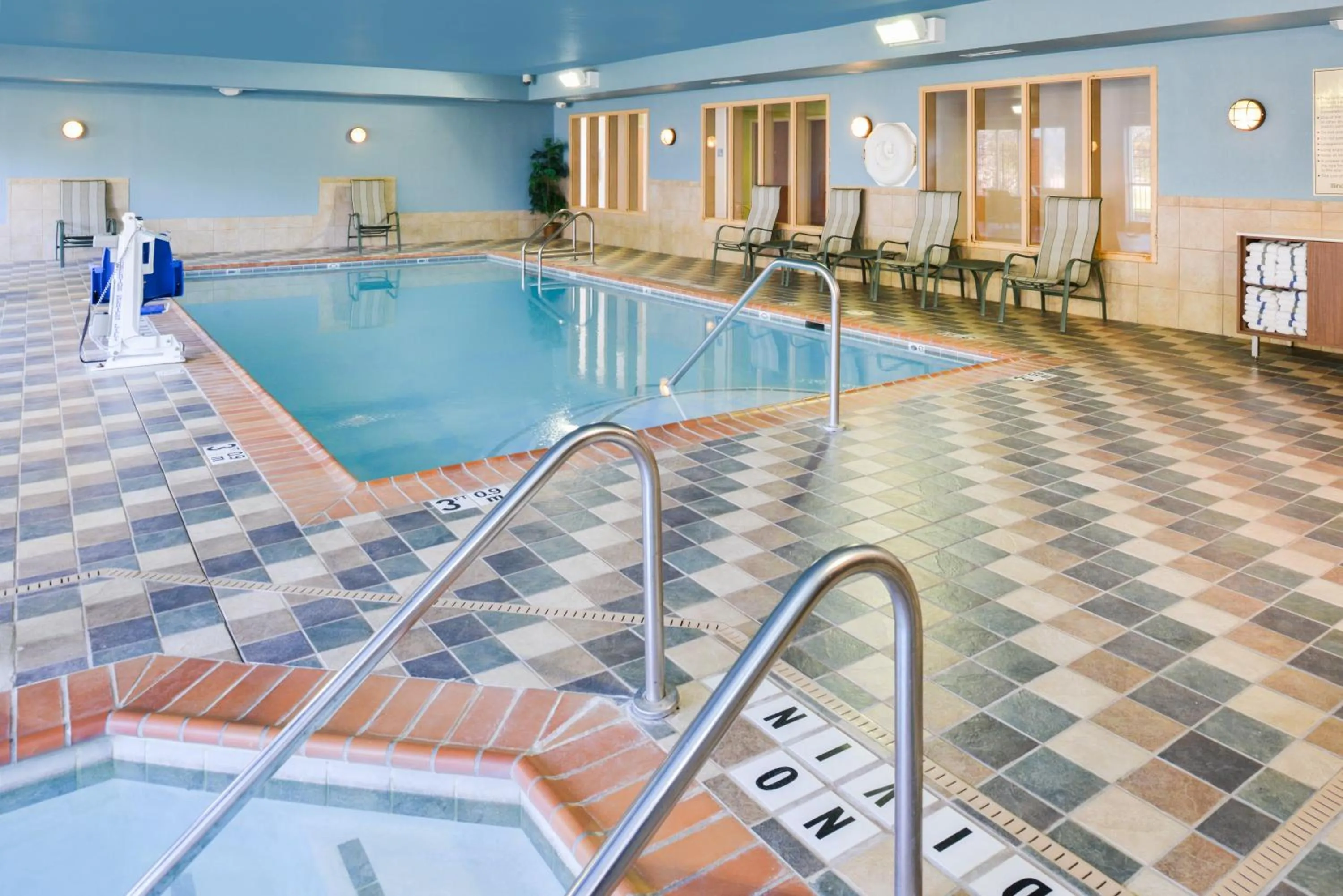 Swimming pool in Holiday Inn Express Hotel & Suites Urbana-Champaign-U of I Area by IHG