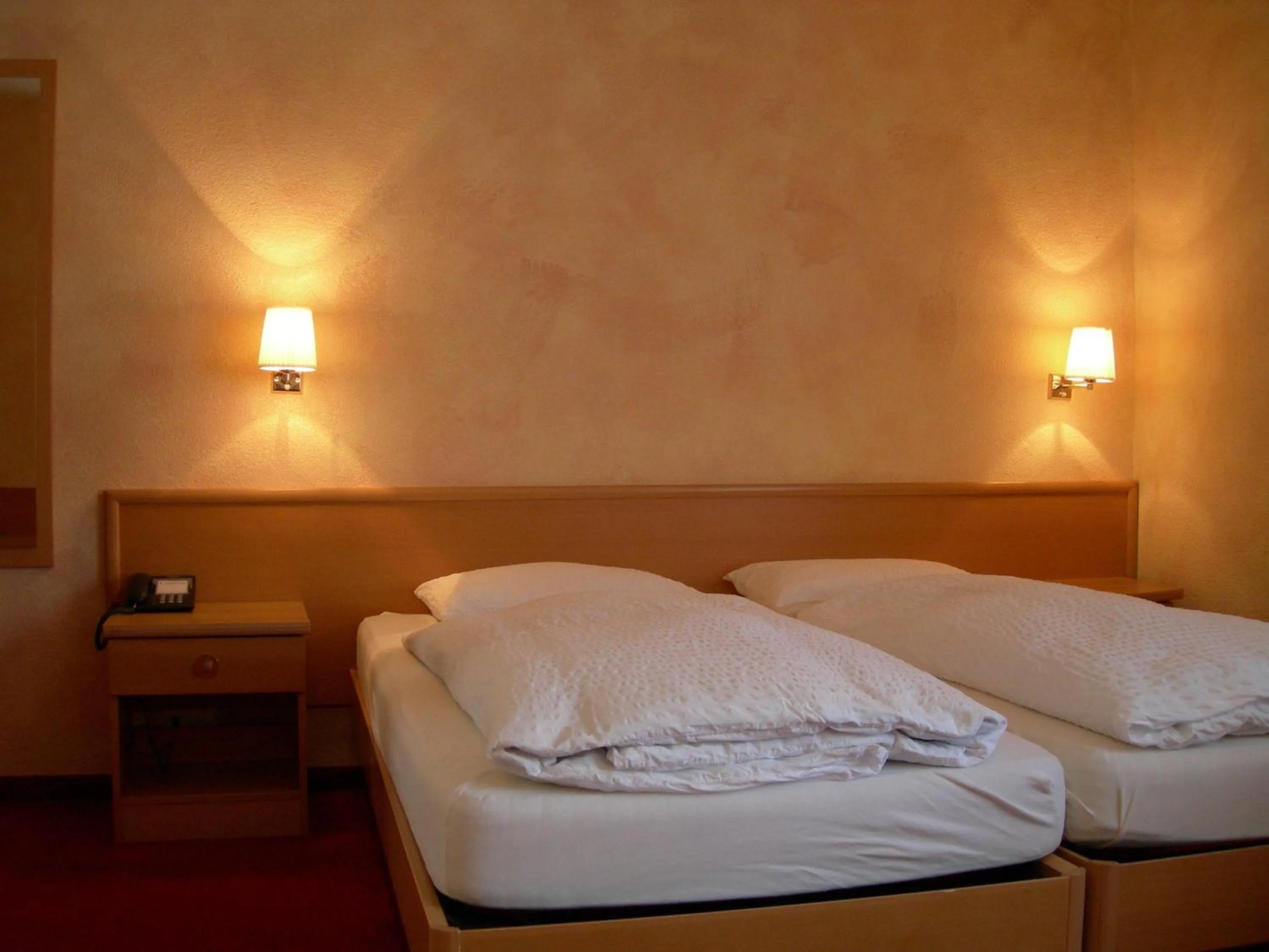 Bed in Hotel Crystal Interlaken