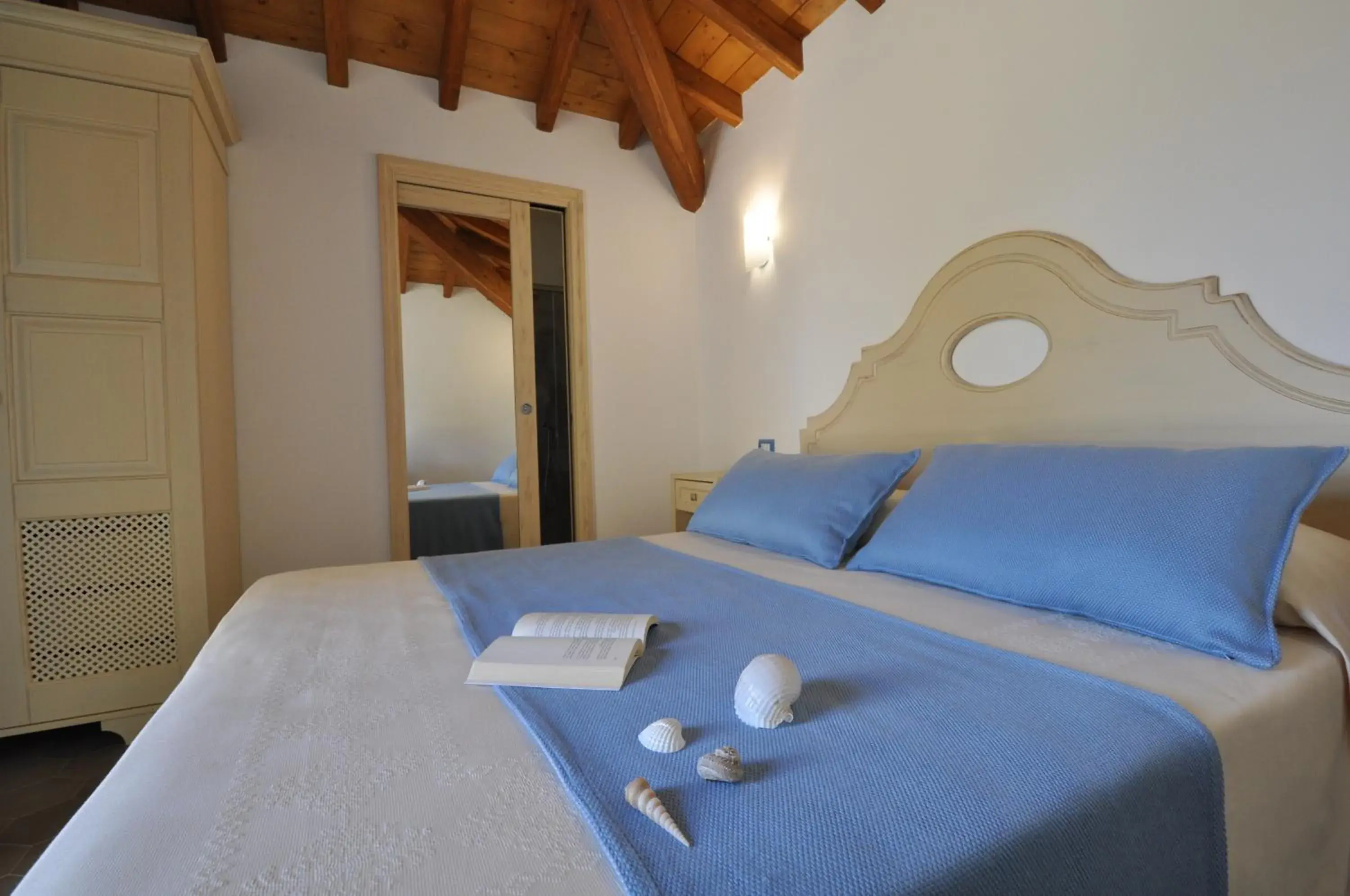 Double Room with Patio and Garden View in Le Anfore Hotel Double Room with Patio and Garden View in Le Anfore Hotel