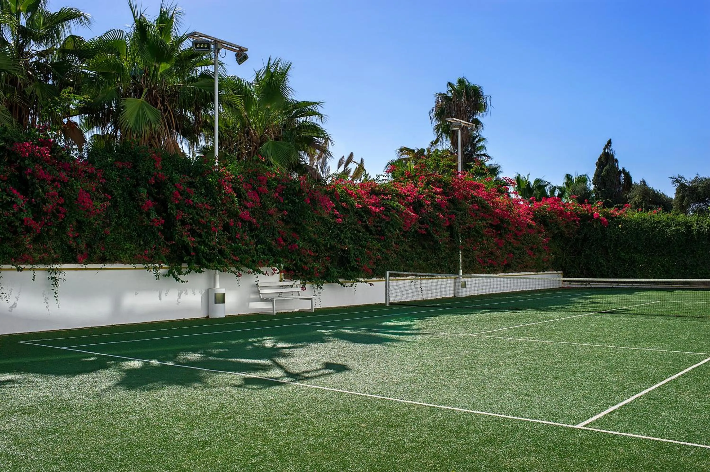 Tennis court in Grecian Sands Hotel