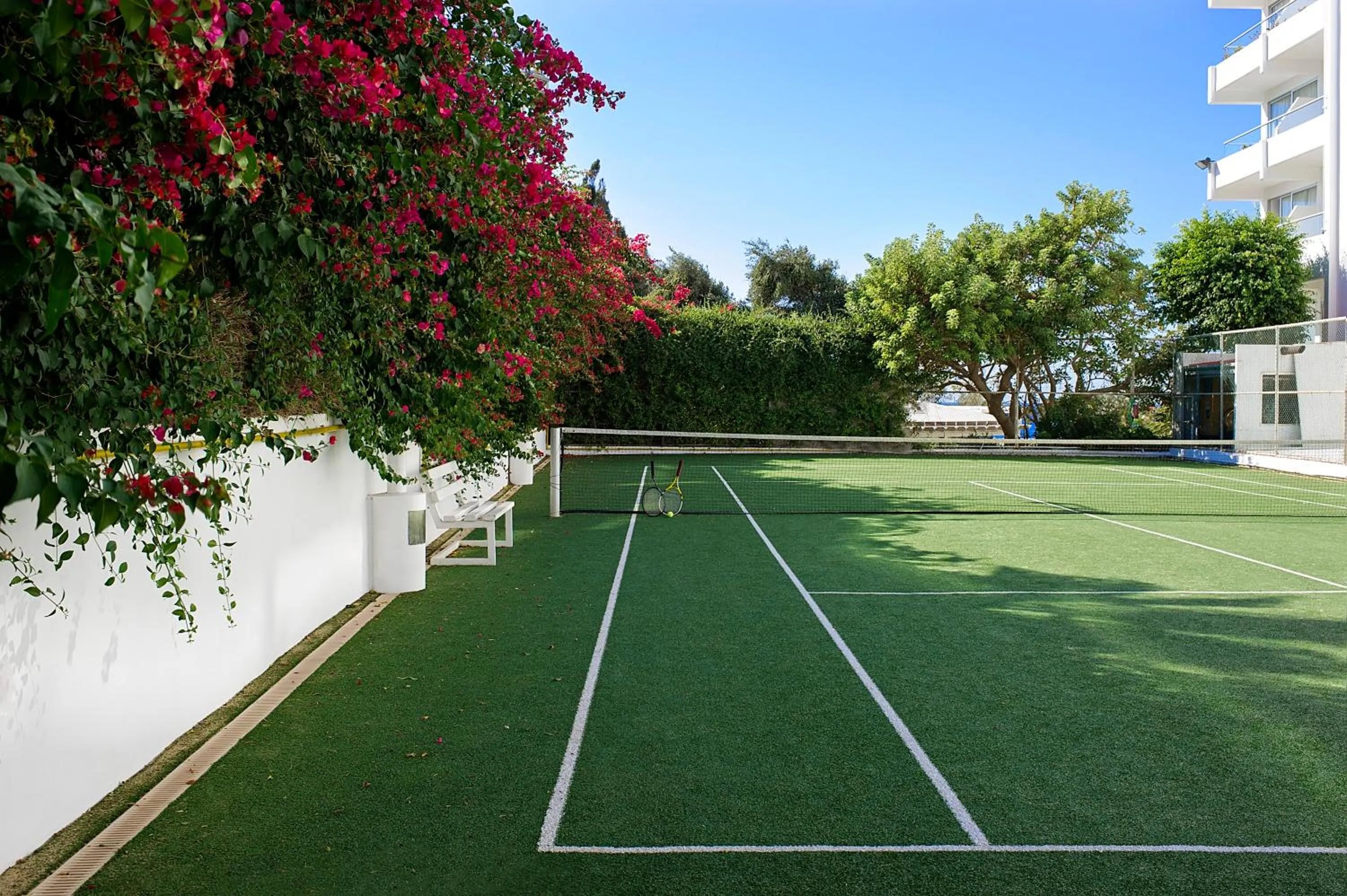 Tennis court in Grecian Sands Hotel