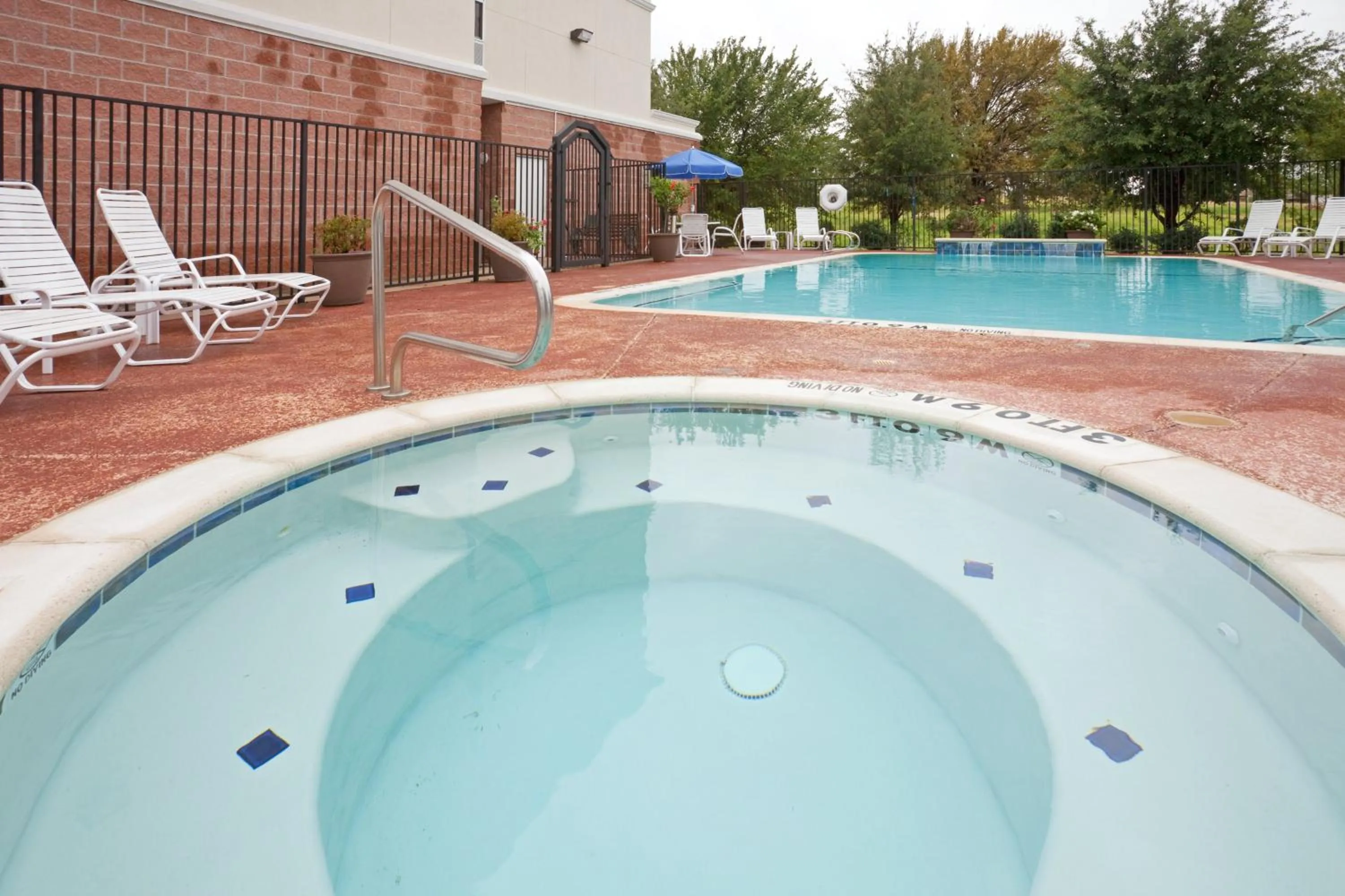 Swimming pool in Holiday Inn Express Hotel & Suites Decatur, TX by IHG