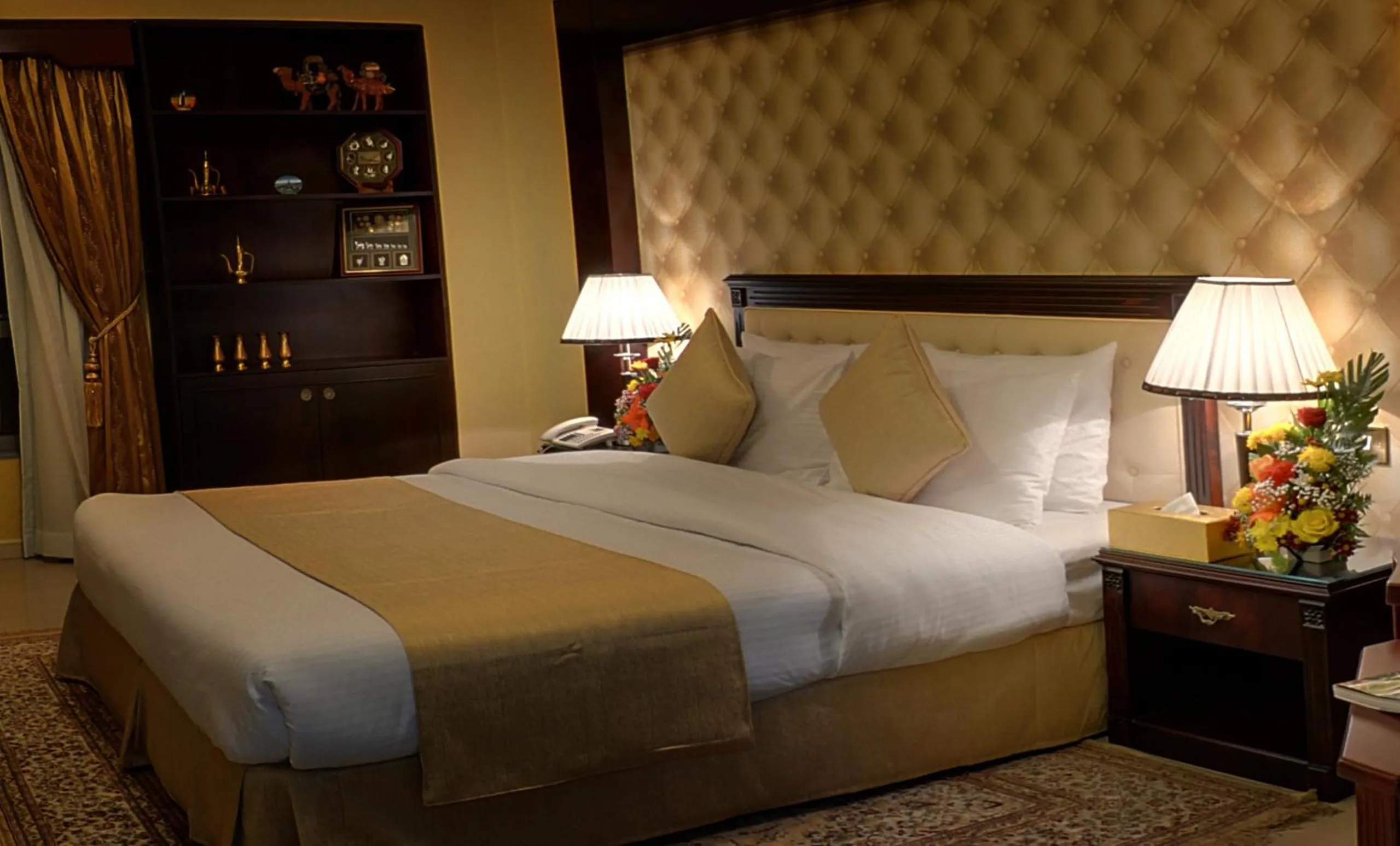 Bed in Deira Suites Deluxe Hotel Suites