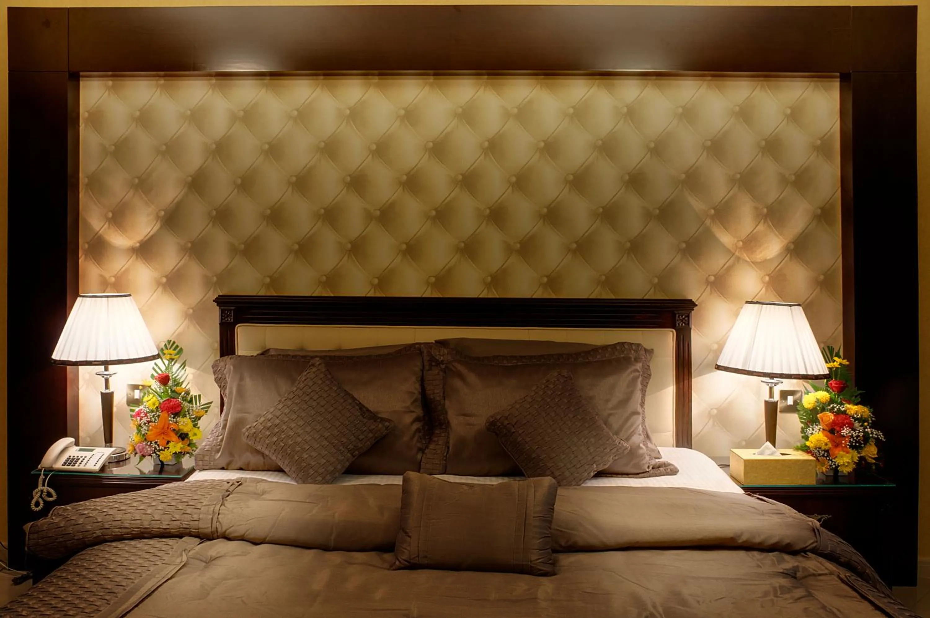 Bed in Deira Suites Deluxe Hotel Suites
