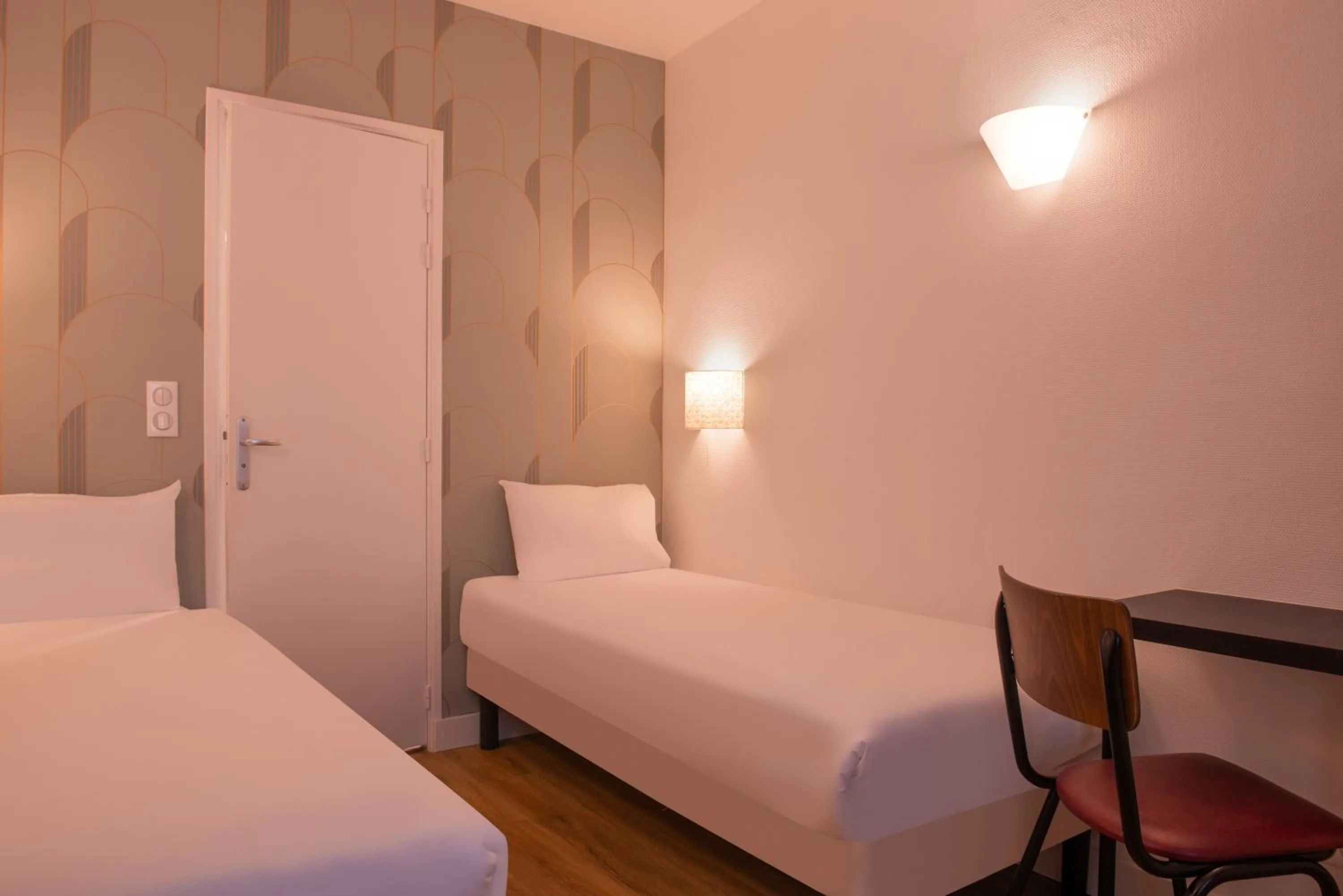 Bed in Pacific Hotel Fondary