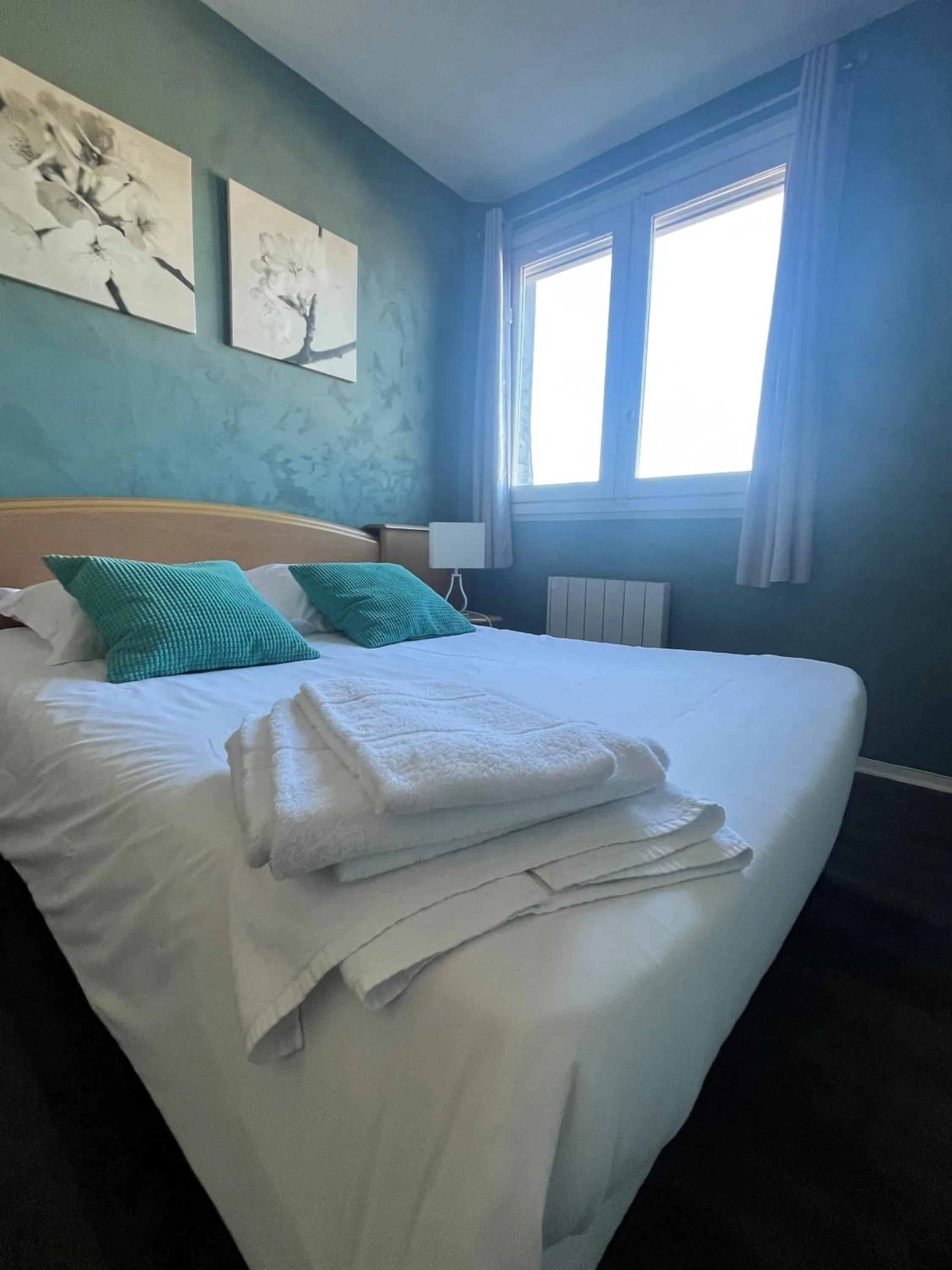 Bed in Hôtel de Bretagne