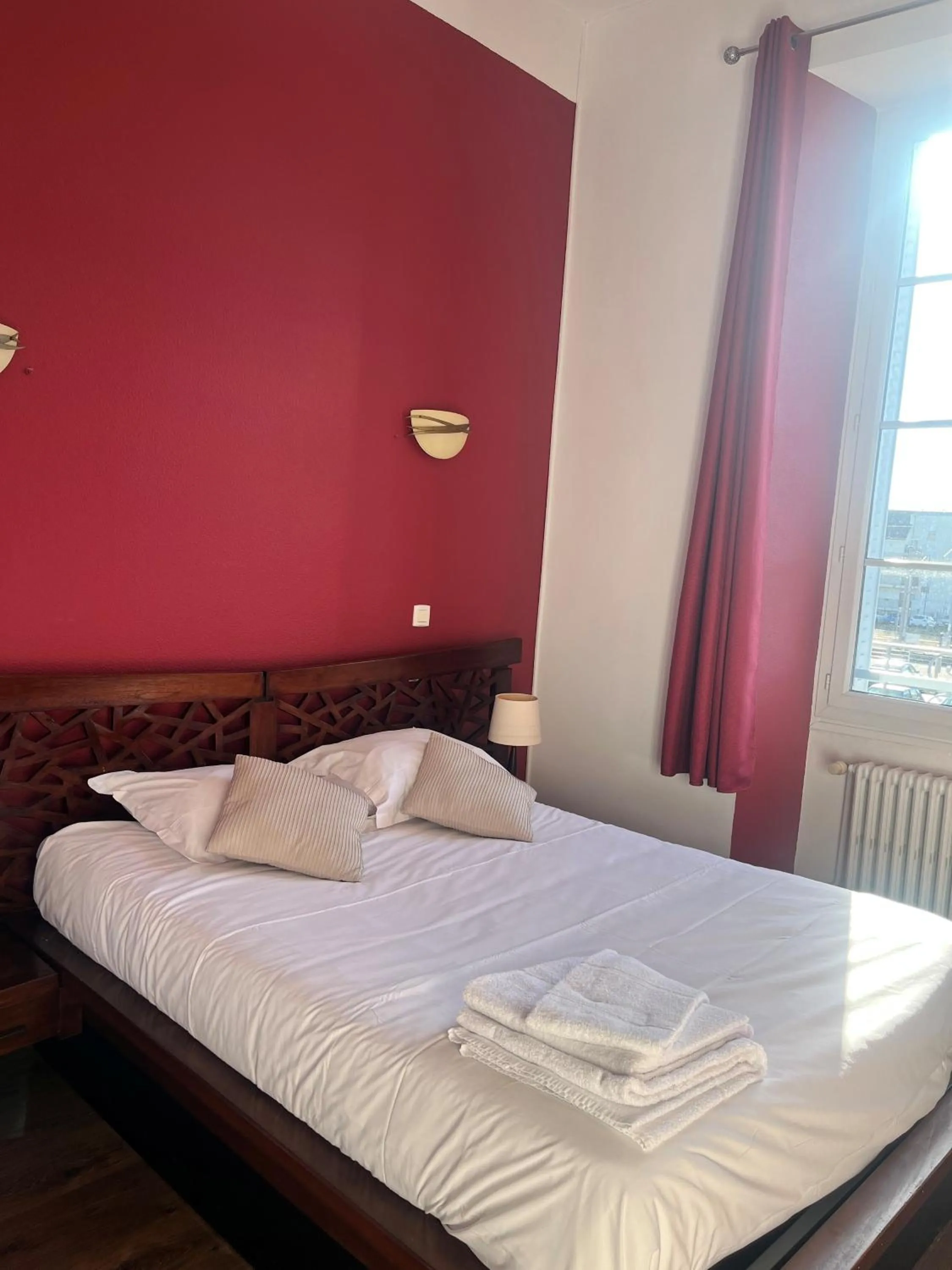 Bed in Hôtel de Bretagne