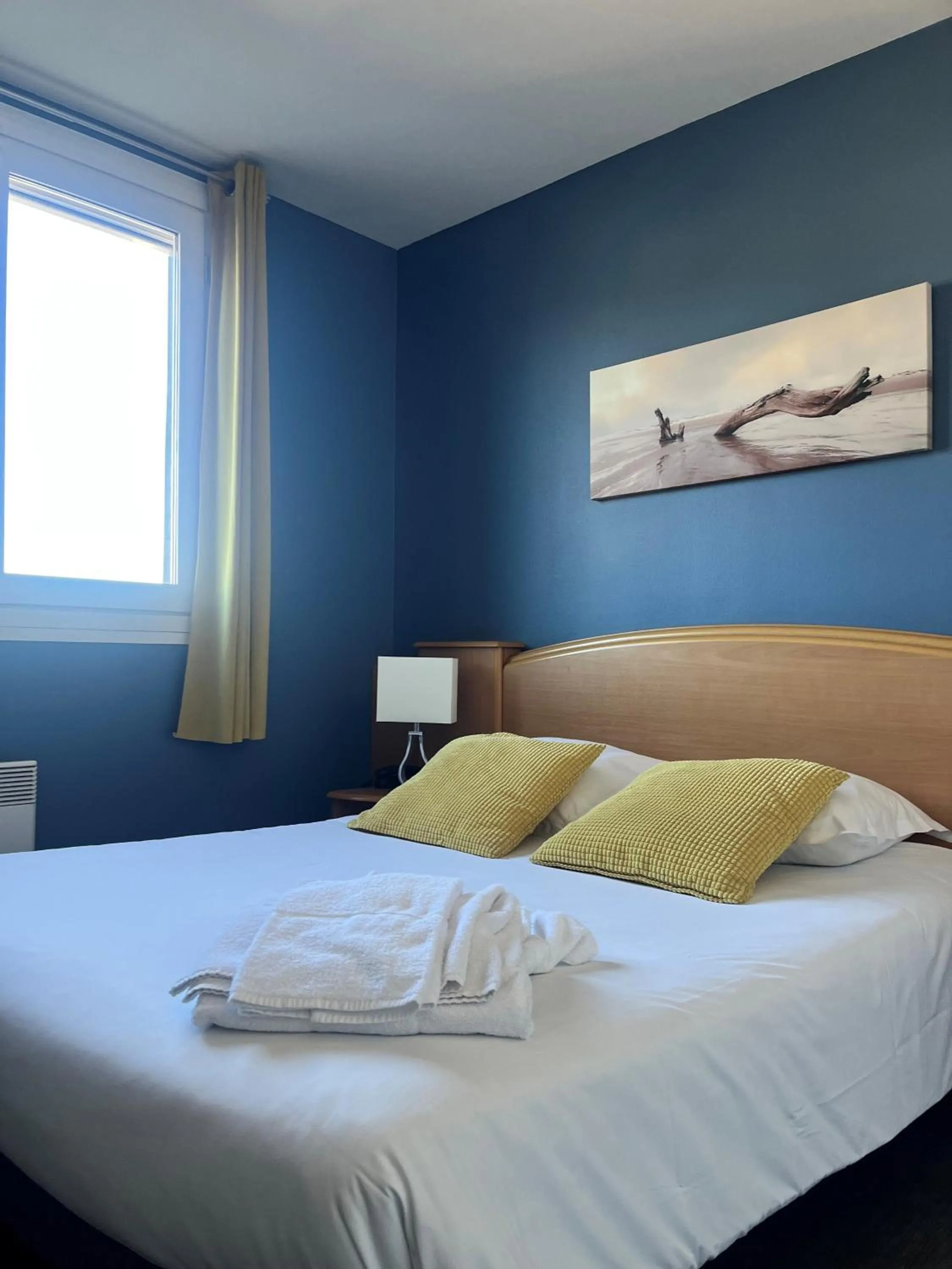 Bed in Hôtel de Bretagne