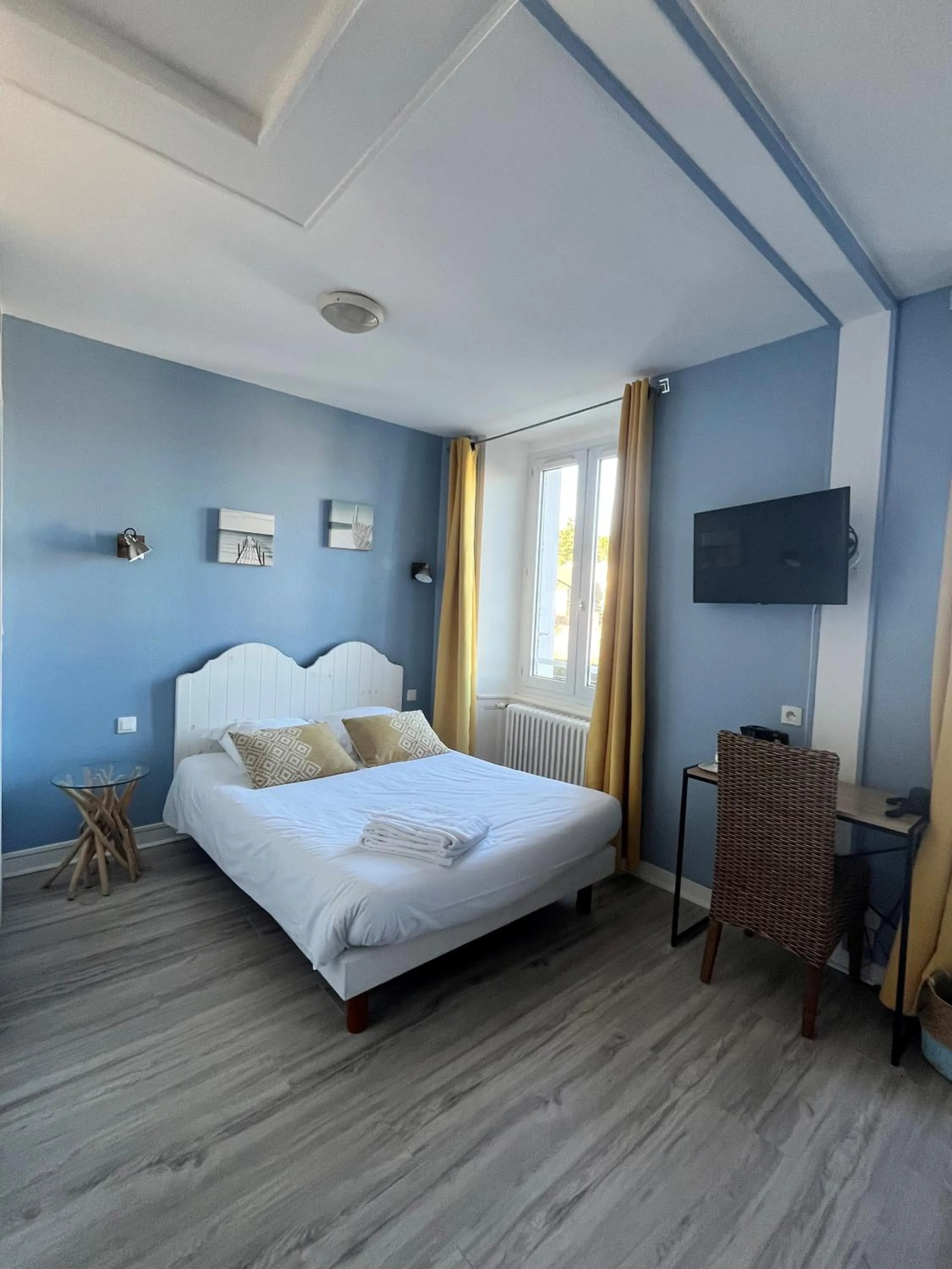 Bed in Hôtel de Bretagne