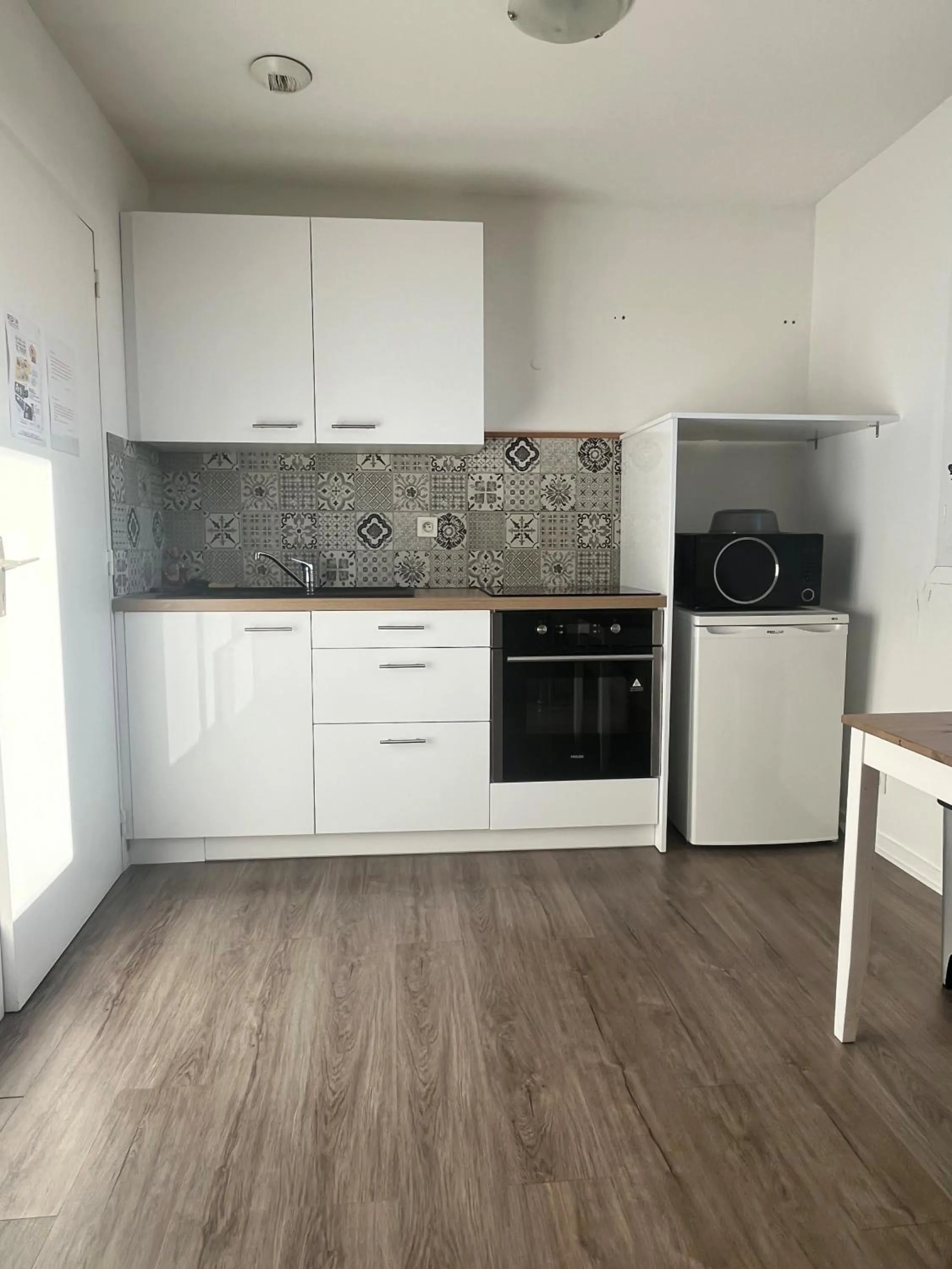 Kitchen or kitchenette in Hôtel de Bretagne