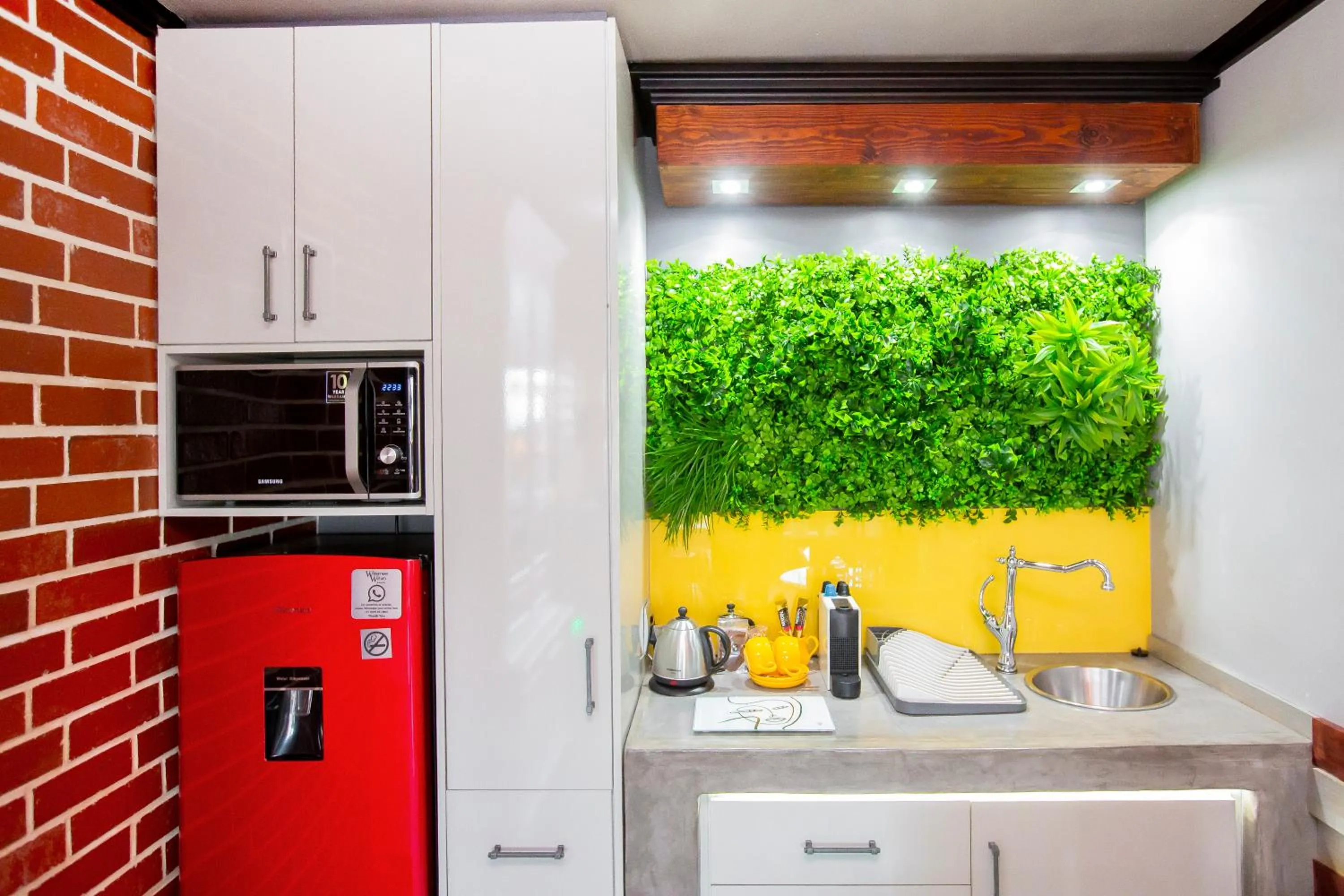 Kitchen or kitchenette in Wilderness Waters Boutique Suites - Adults Only