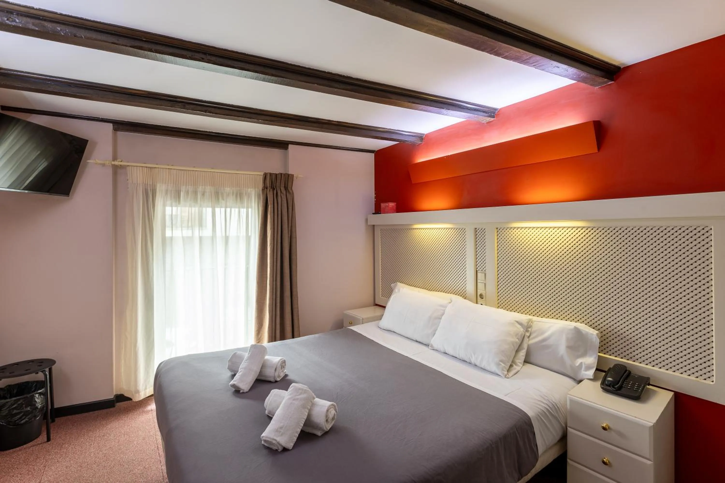 Bed in Hotel Micolau