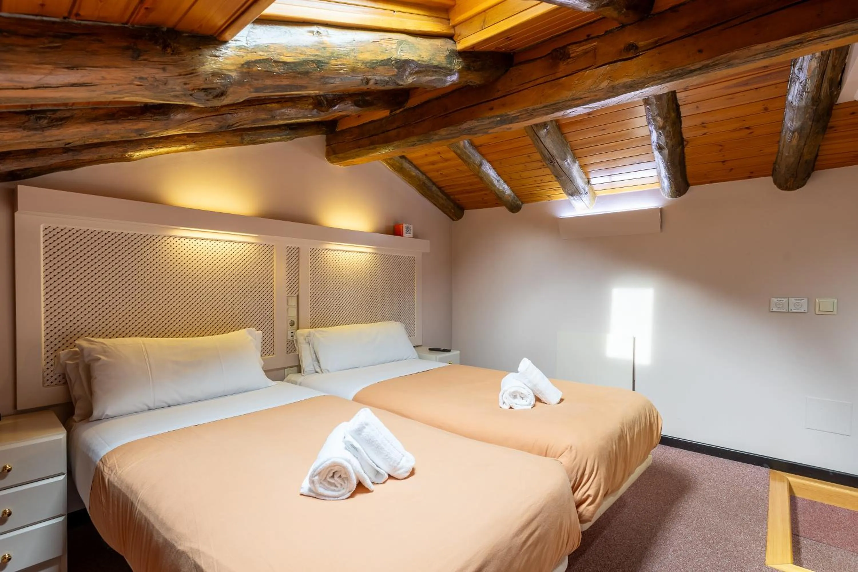 Bed in Hotel Micolau