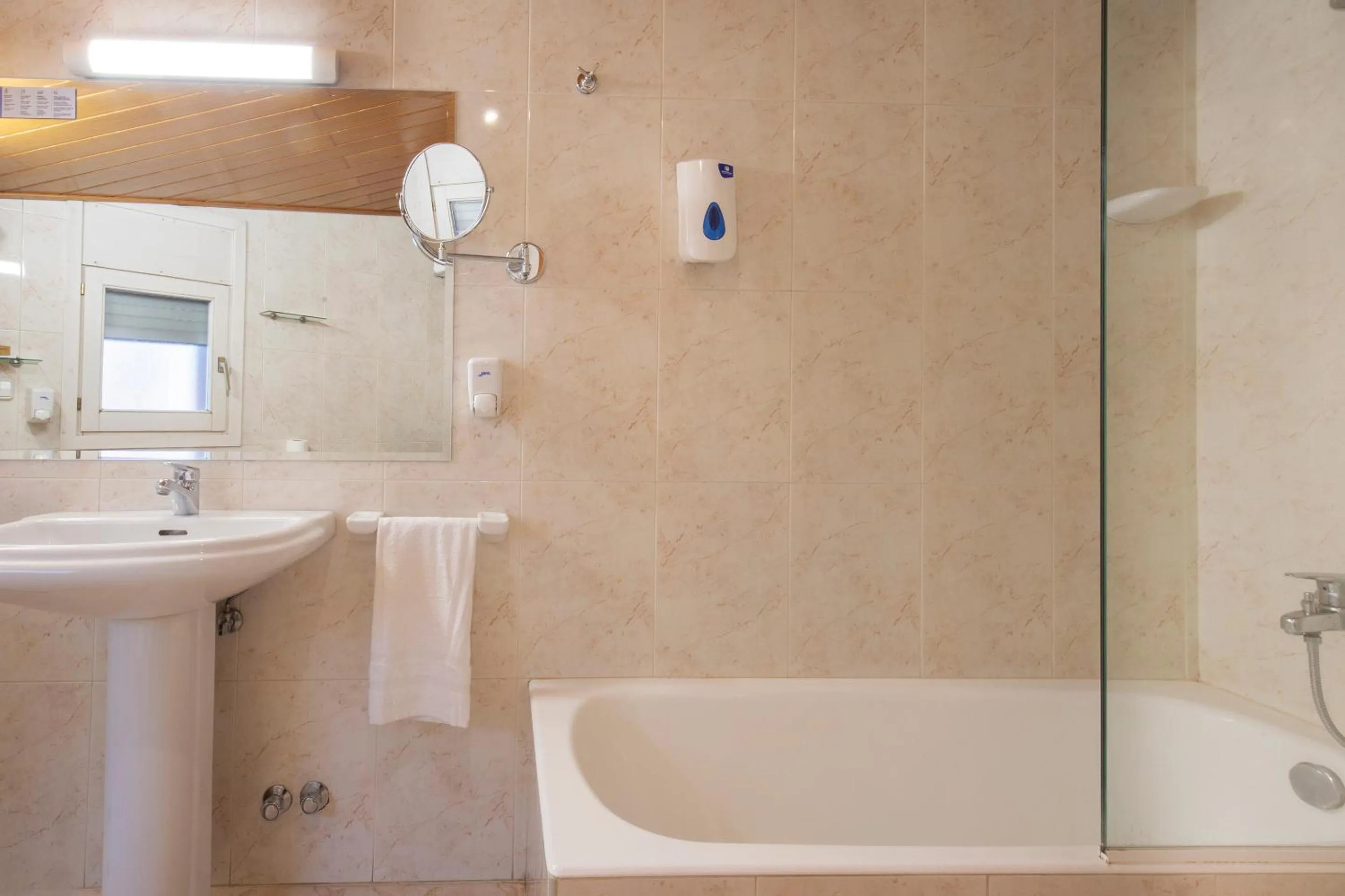 Bathroom in Hotel Oros by Nexta