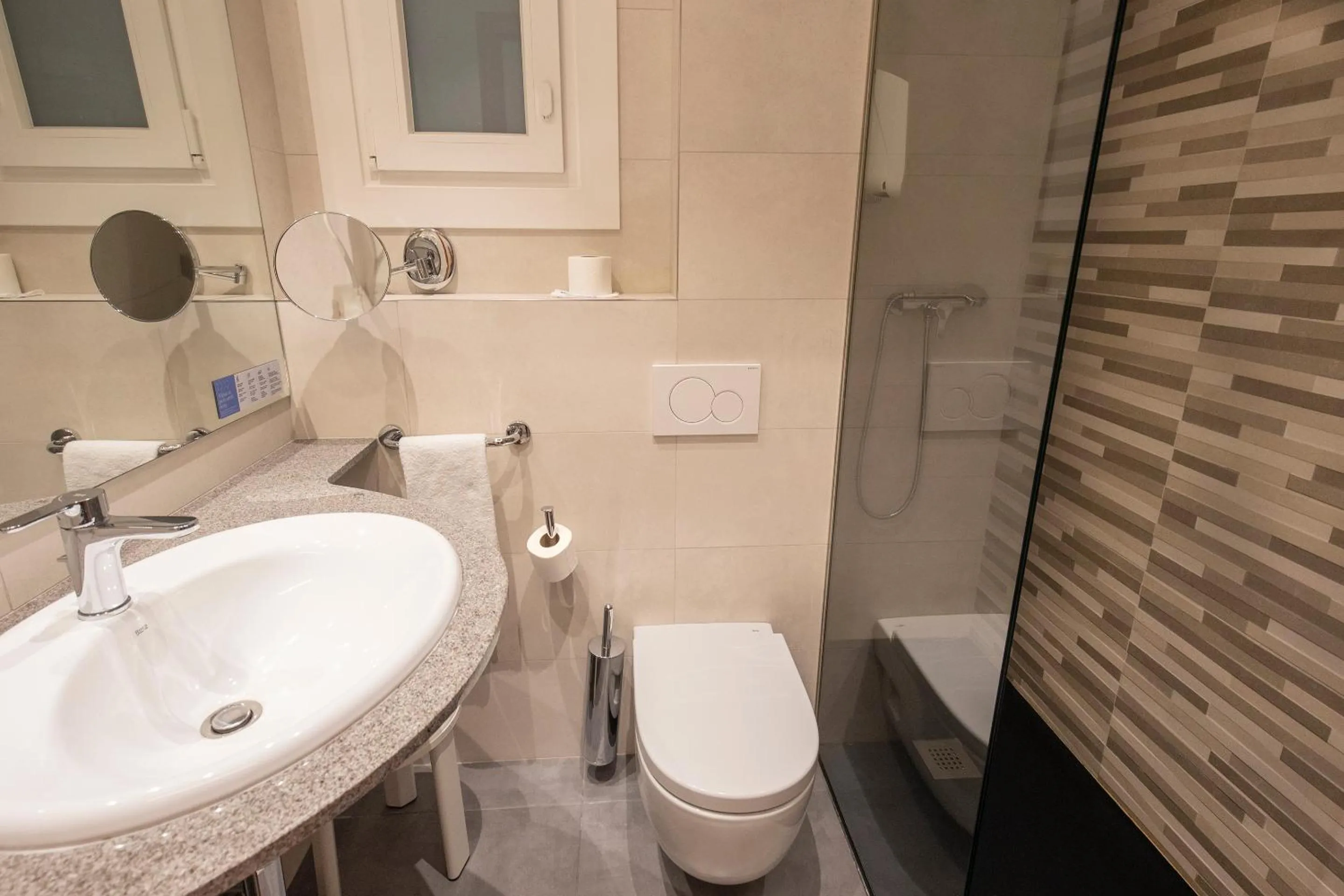 Bathroom in Hotel Oros by Nexta