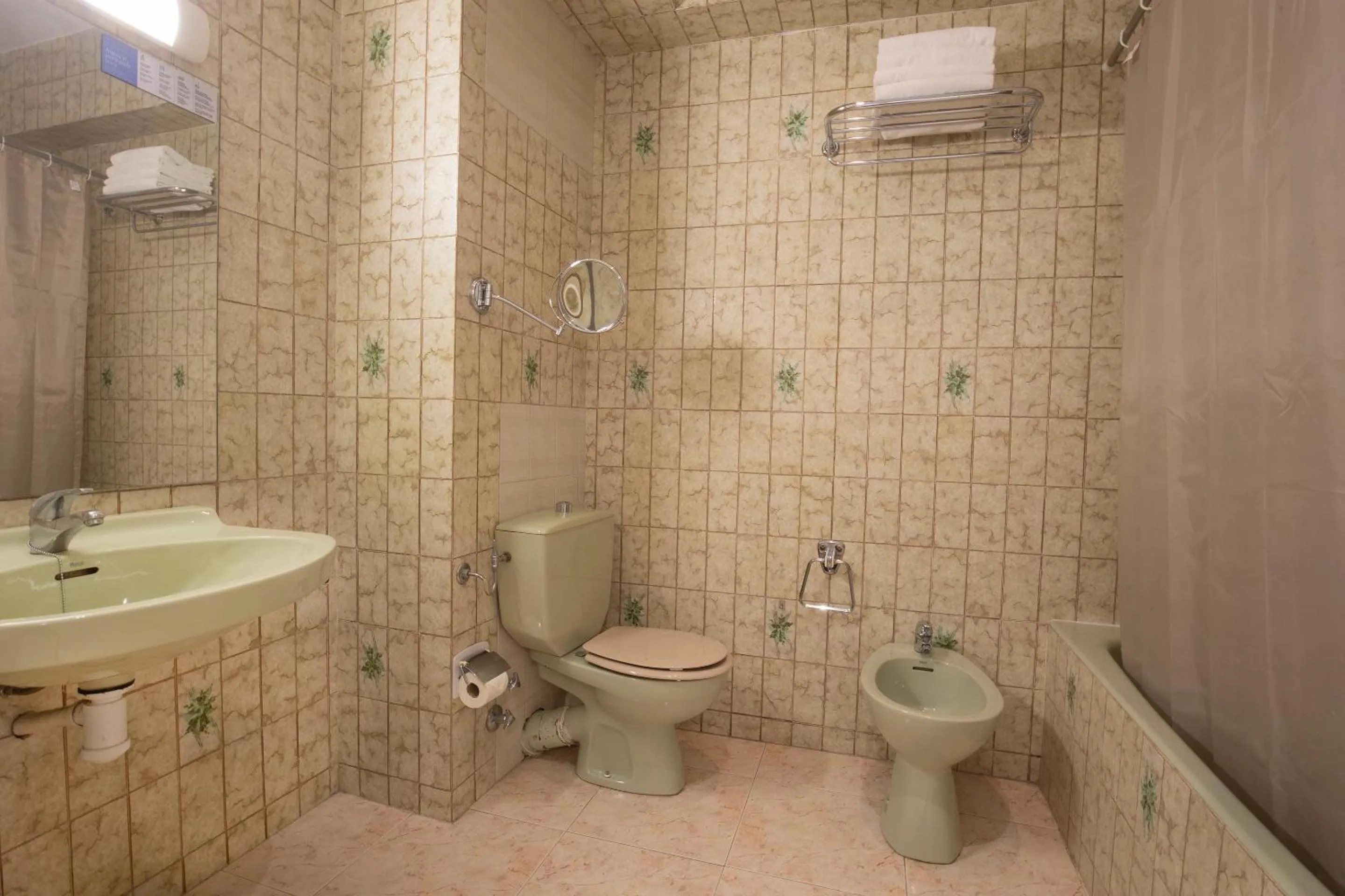 Bathroom in Hotel Oros by Nexta