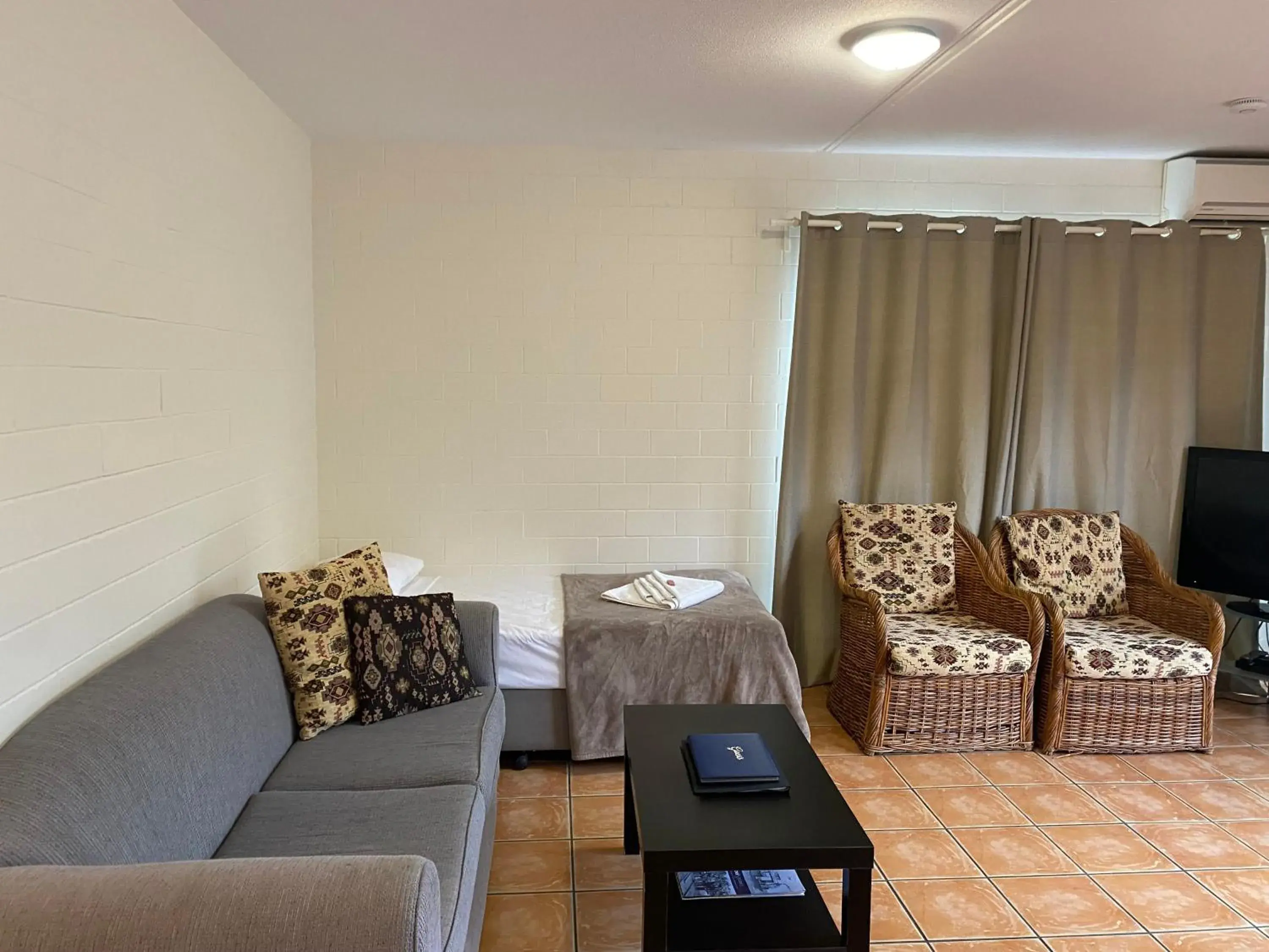 Family Room with Balcony in The Islander Family Room with Balcony in The Islander