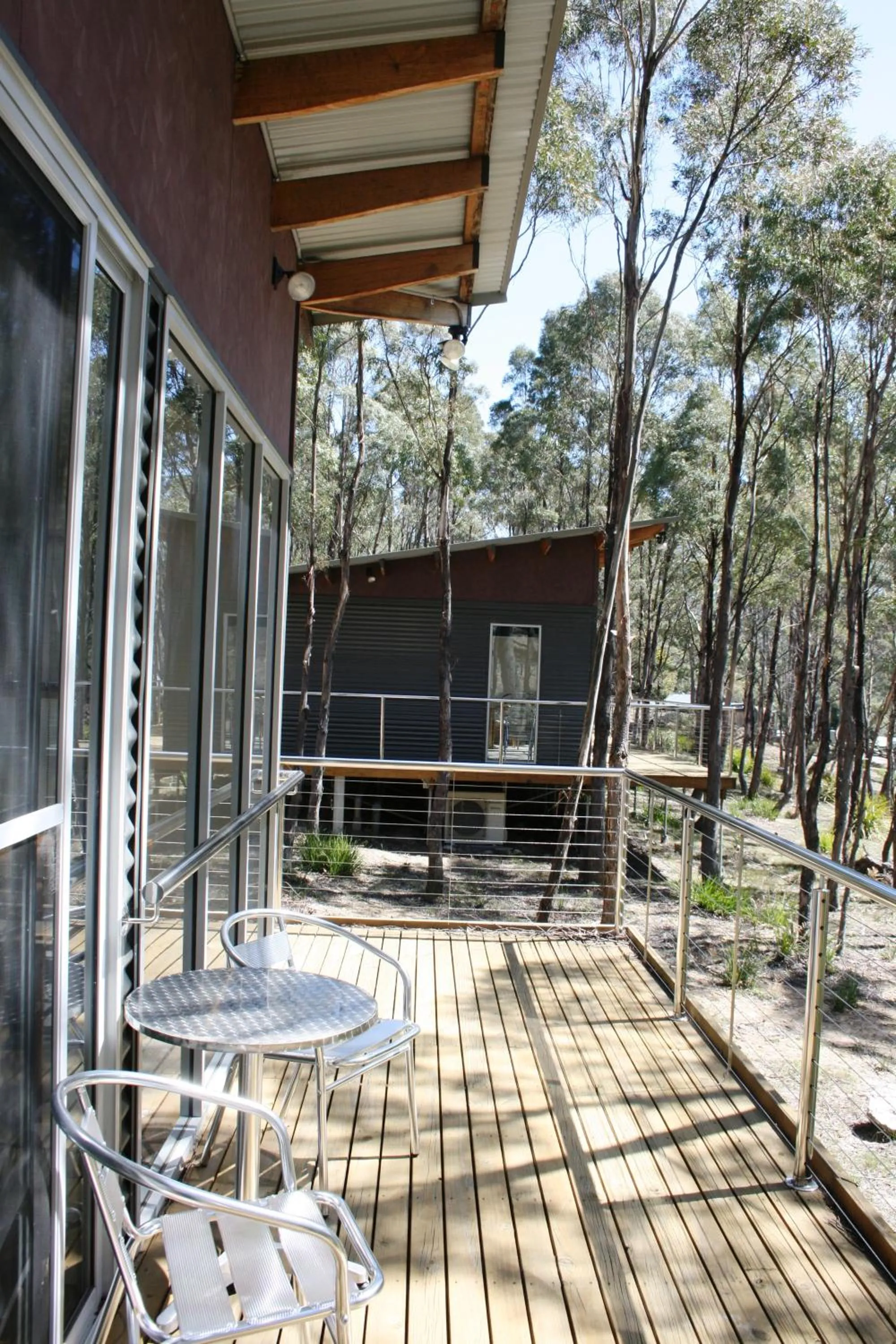 Balcony/Terrace in Craggy Peaks Wilderness Cabins
