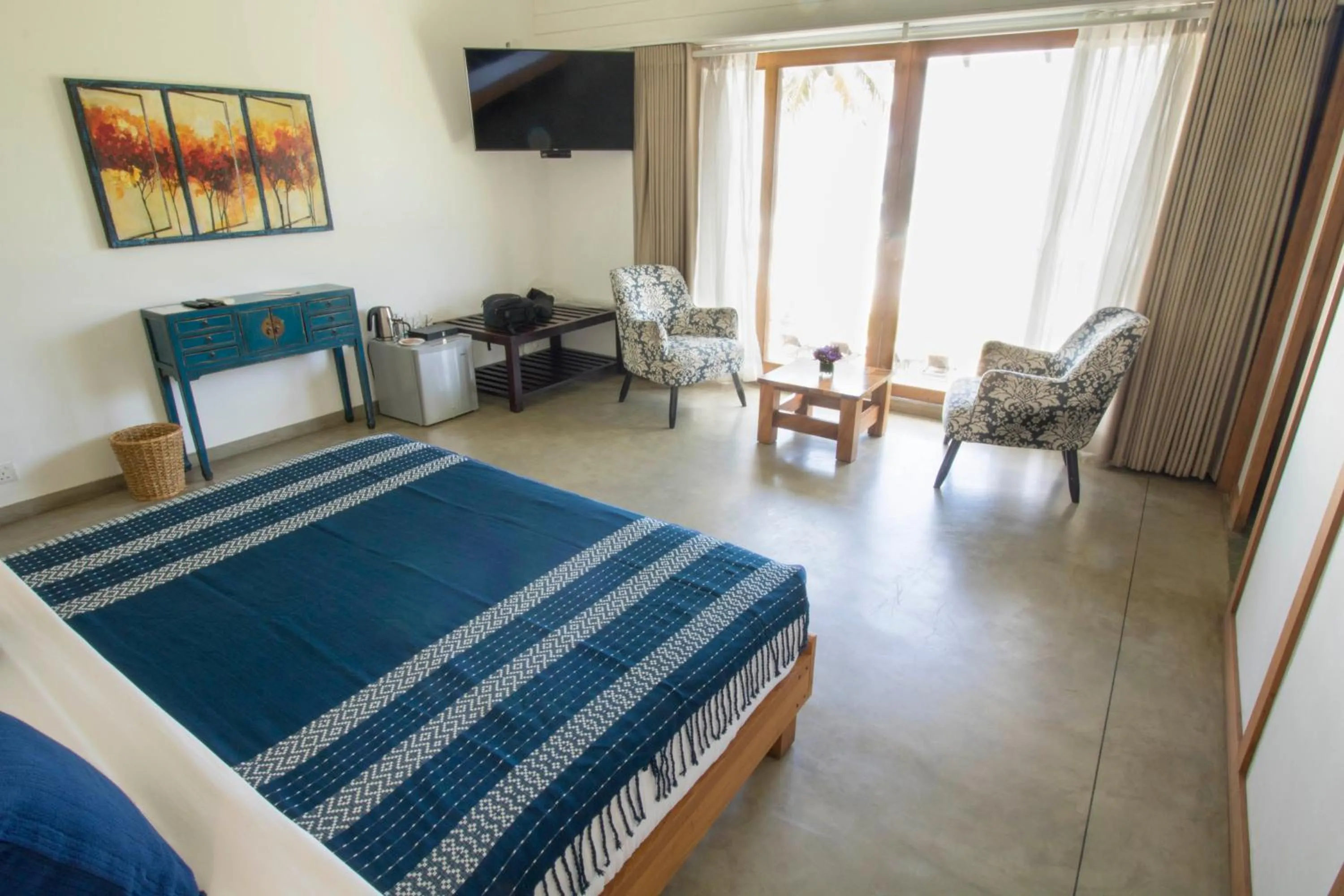 Bed in Ubuntu Beach Villas by Reveal