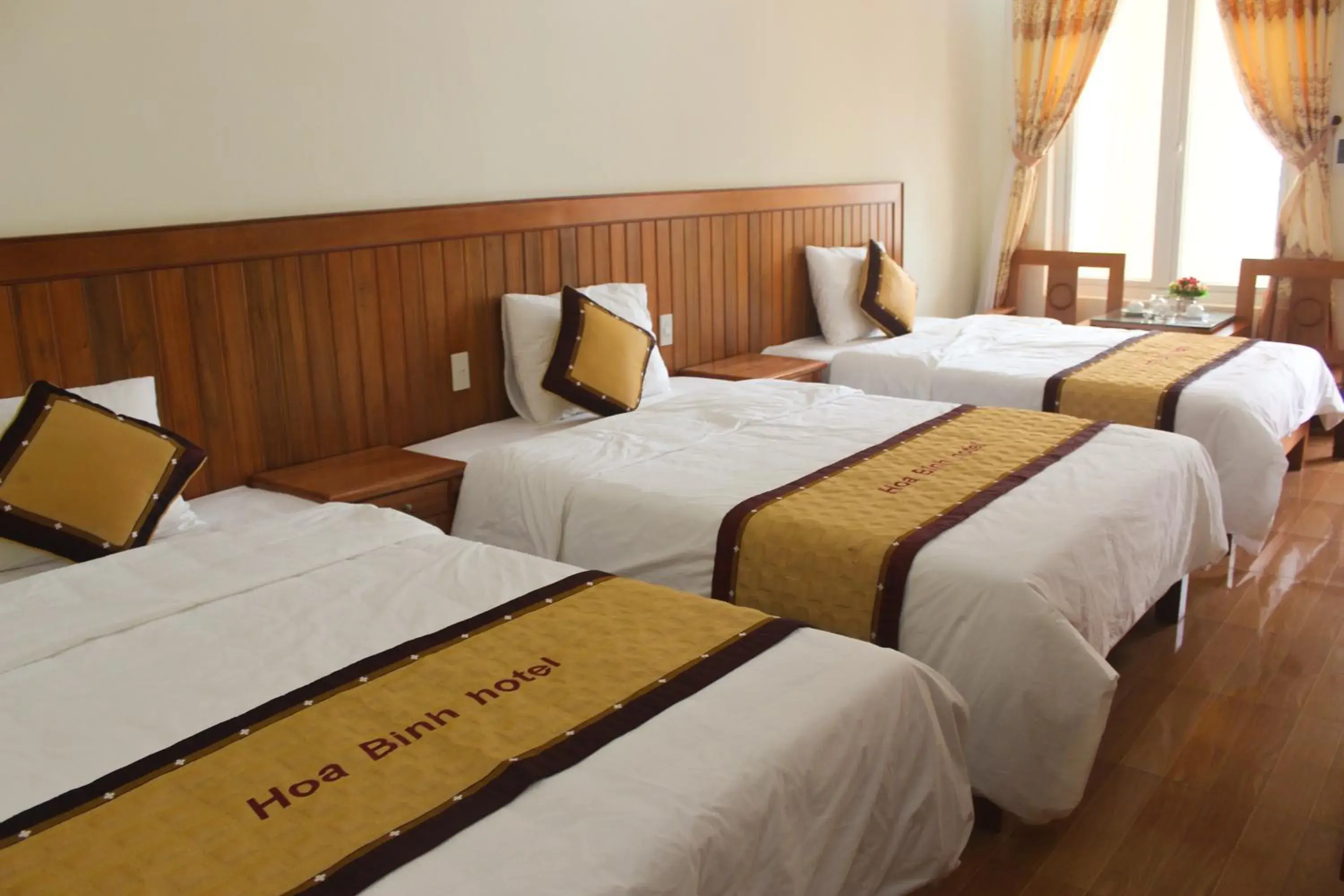 Deluxe Triple Room in Hoa Binh Hotel Deluxe Triple Room in Hoa Binh Hotel