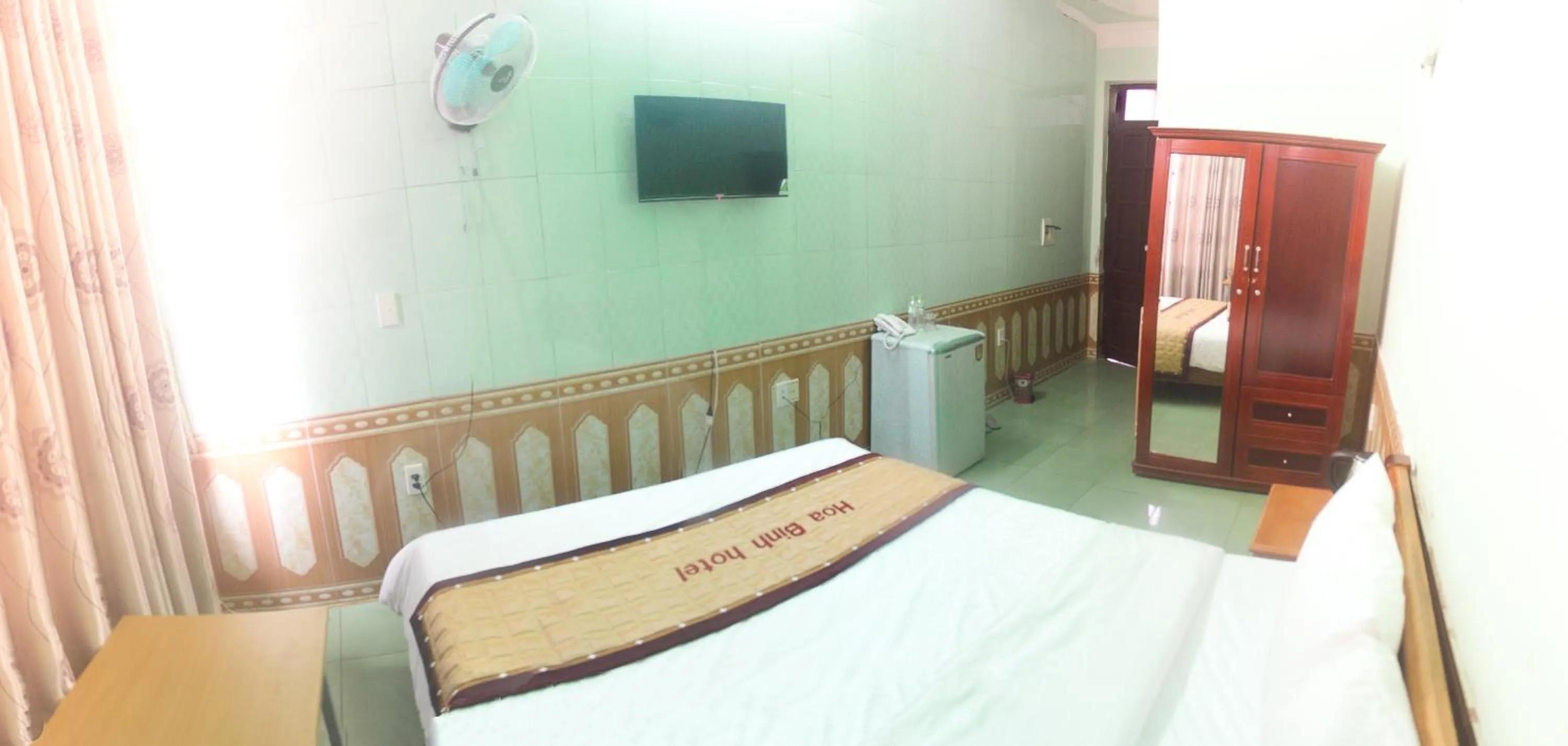 Photo of the whole room, Bed in Hoa Binh Hotel