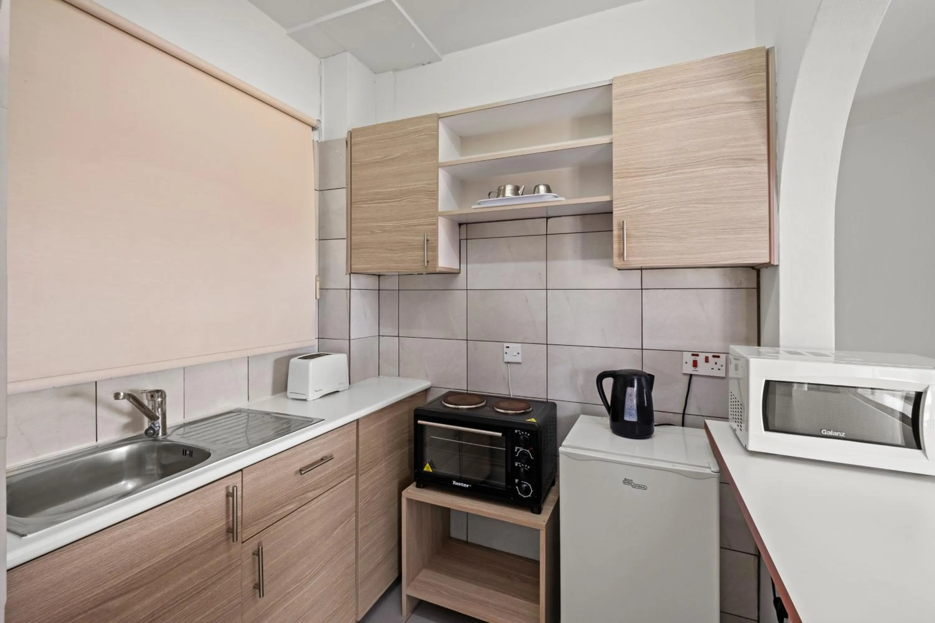 kitchen in Pandream Hotel Apartments