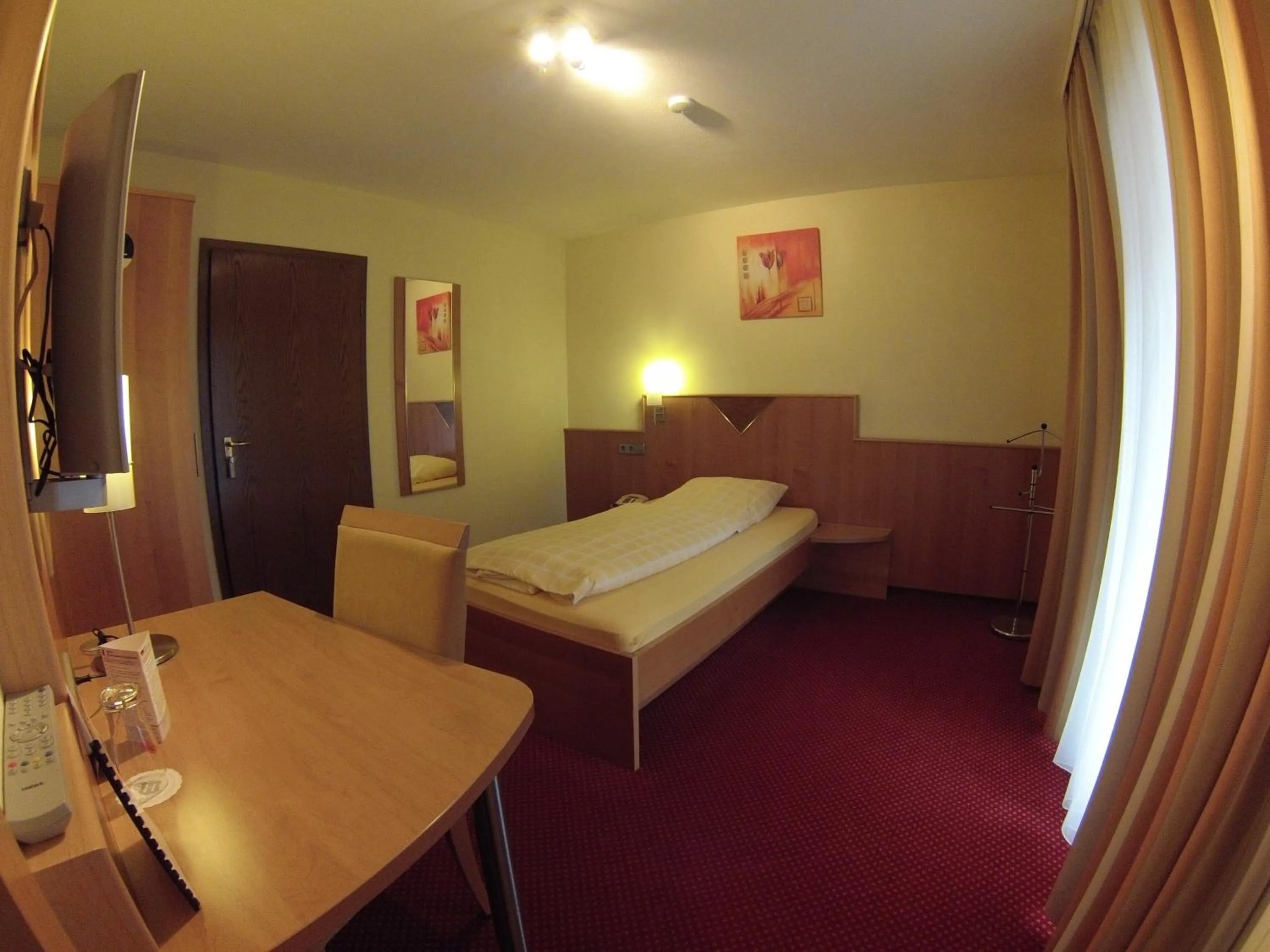 Photo of the whole room, Bed in Hotel KRONE Garni