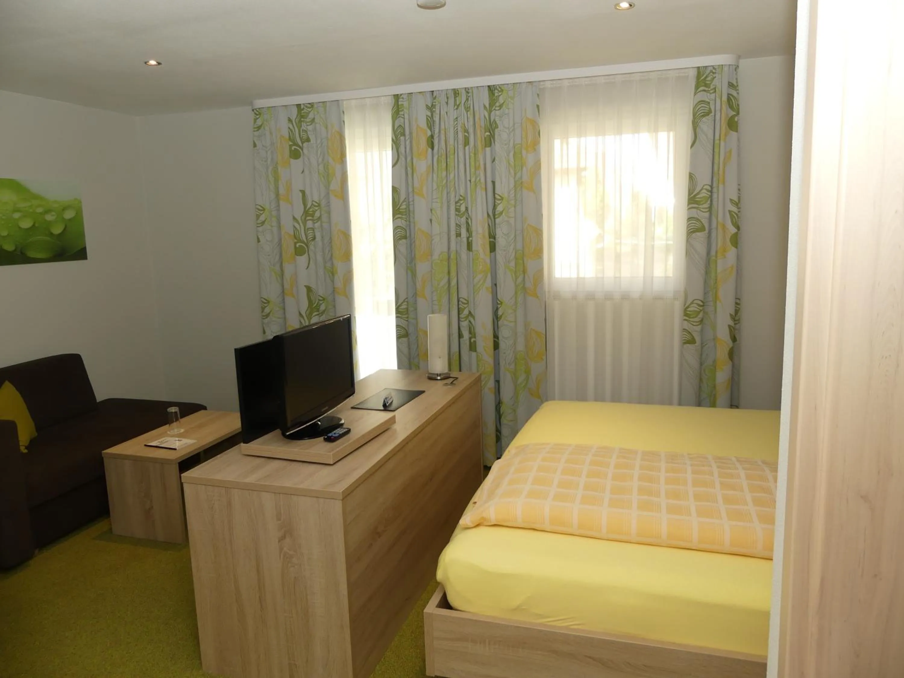 Photo of the whole room, Bed in Hotel KRONE Garni