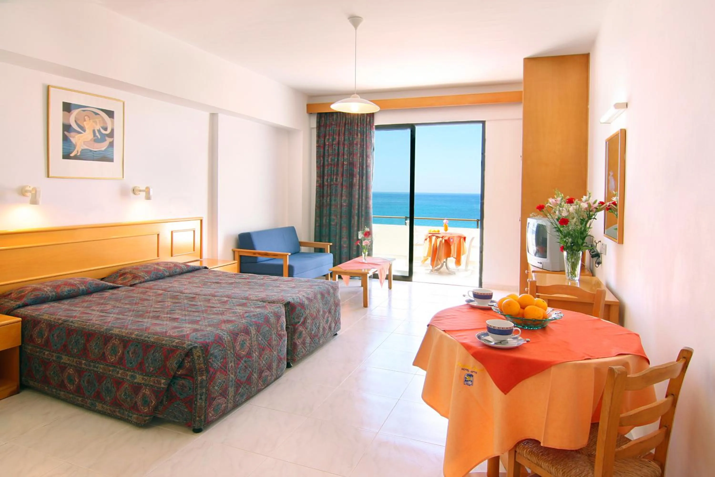 Bed in Corallia Beach Hotel Apartments