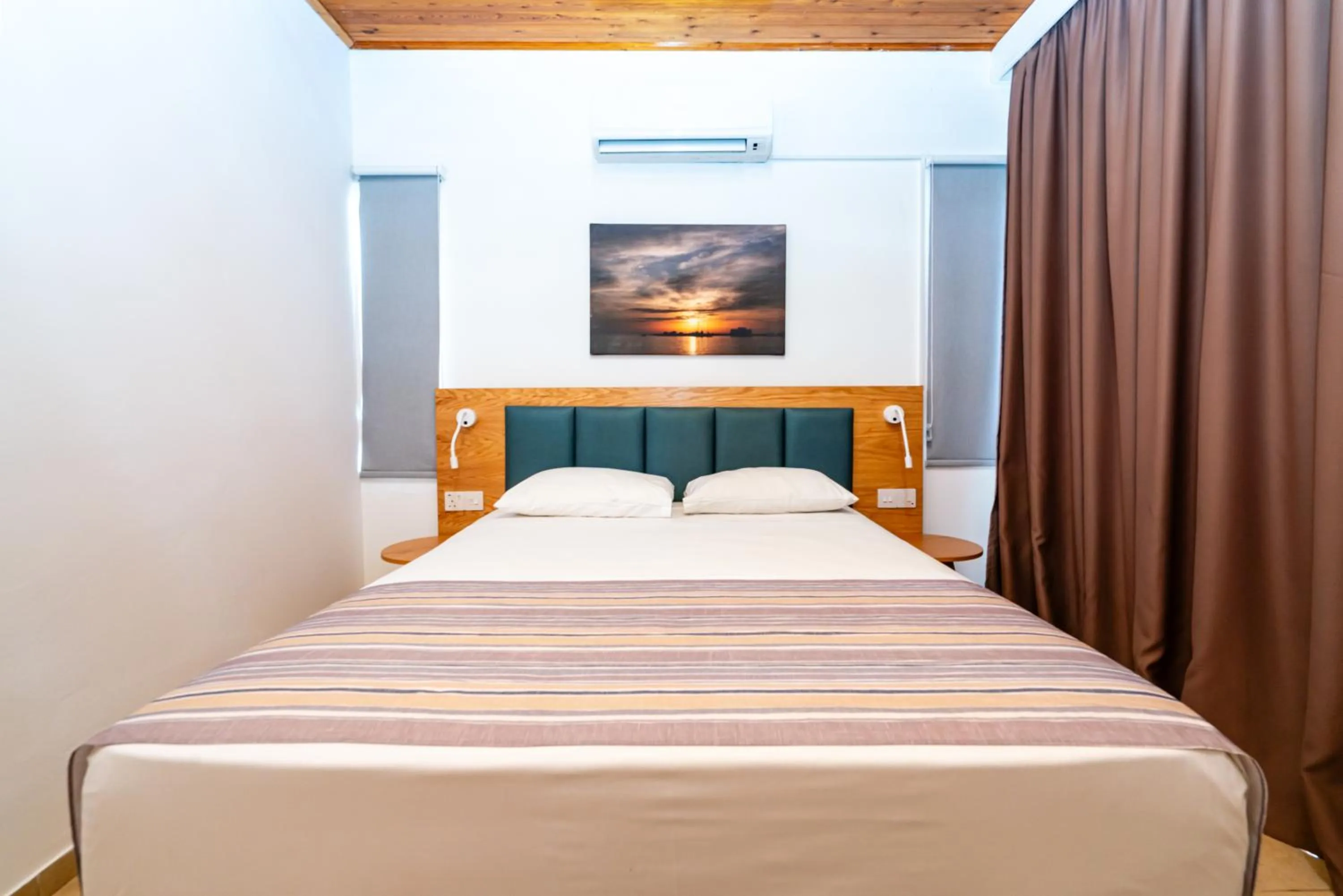 Bedroom, Bed in Helios Bay Hotel and Suites