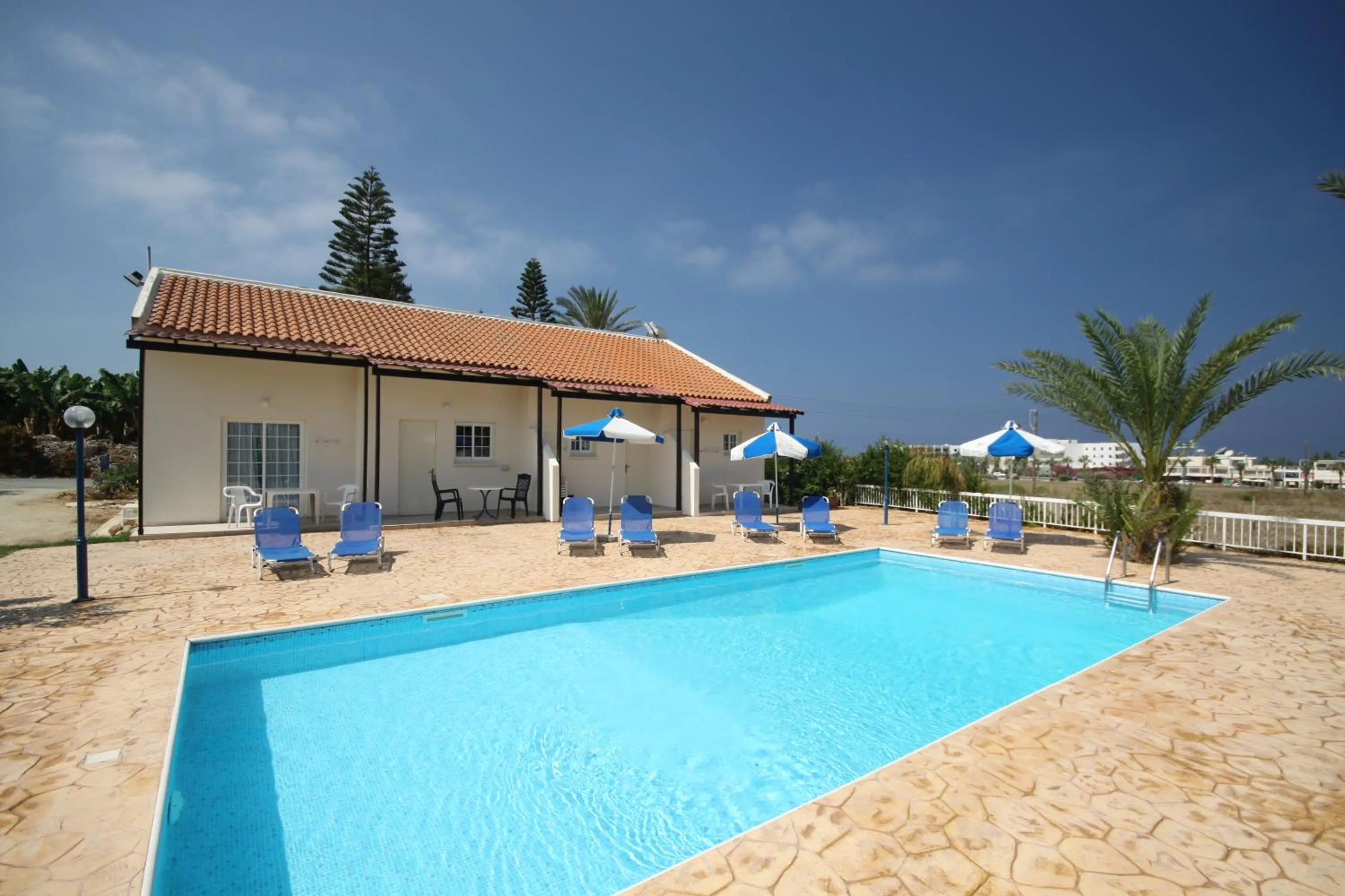 Swimming pool in Helios Bay Hotel and Suites