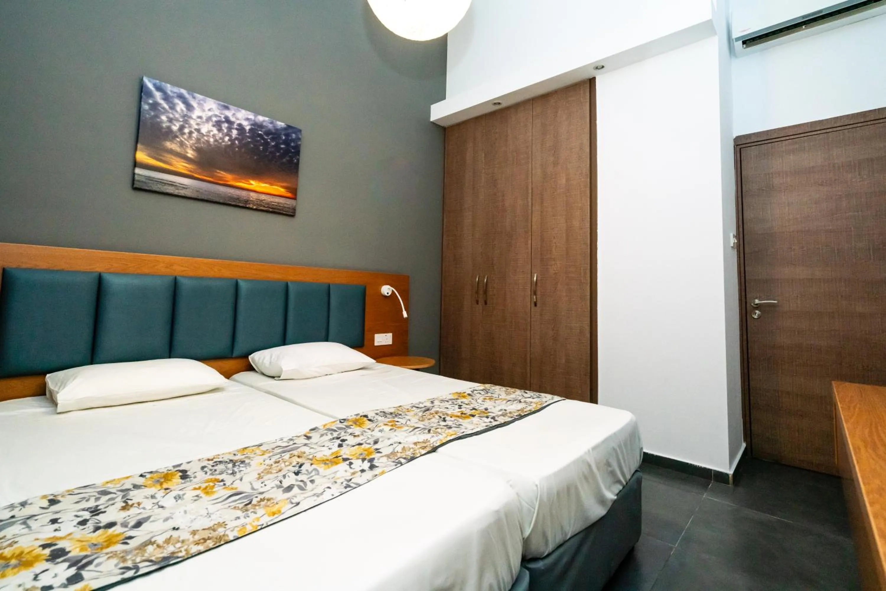 Bedroom, Bed in Helios Bay Hotel and Suites