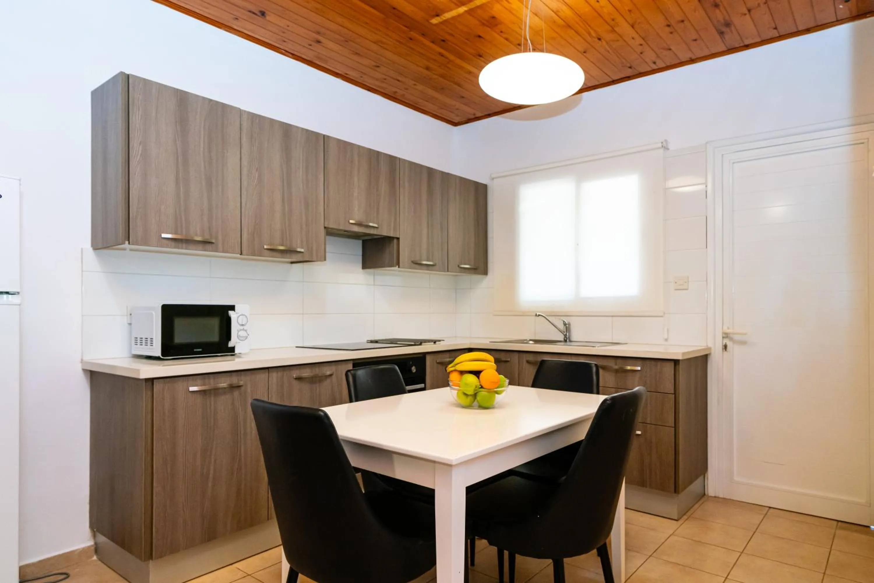 Kitchen or kitchenette in Helios Bay Hotel and Suites