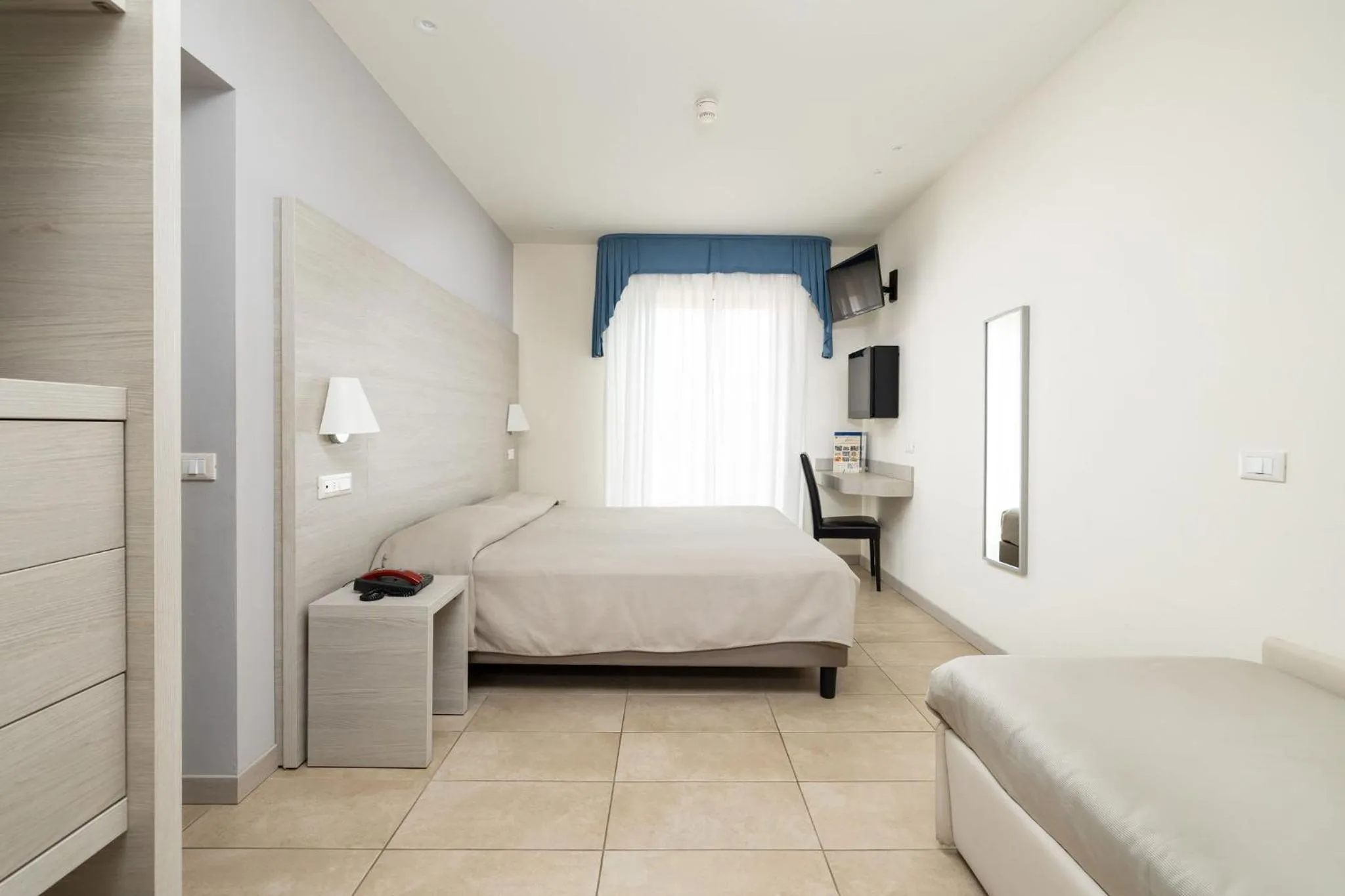 Bed in Hotel Marco Polo