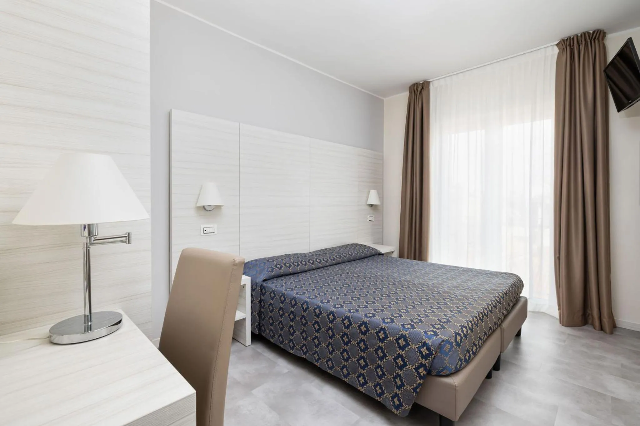 Bed in Hotel Marco Polo