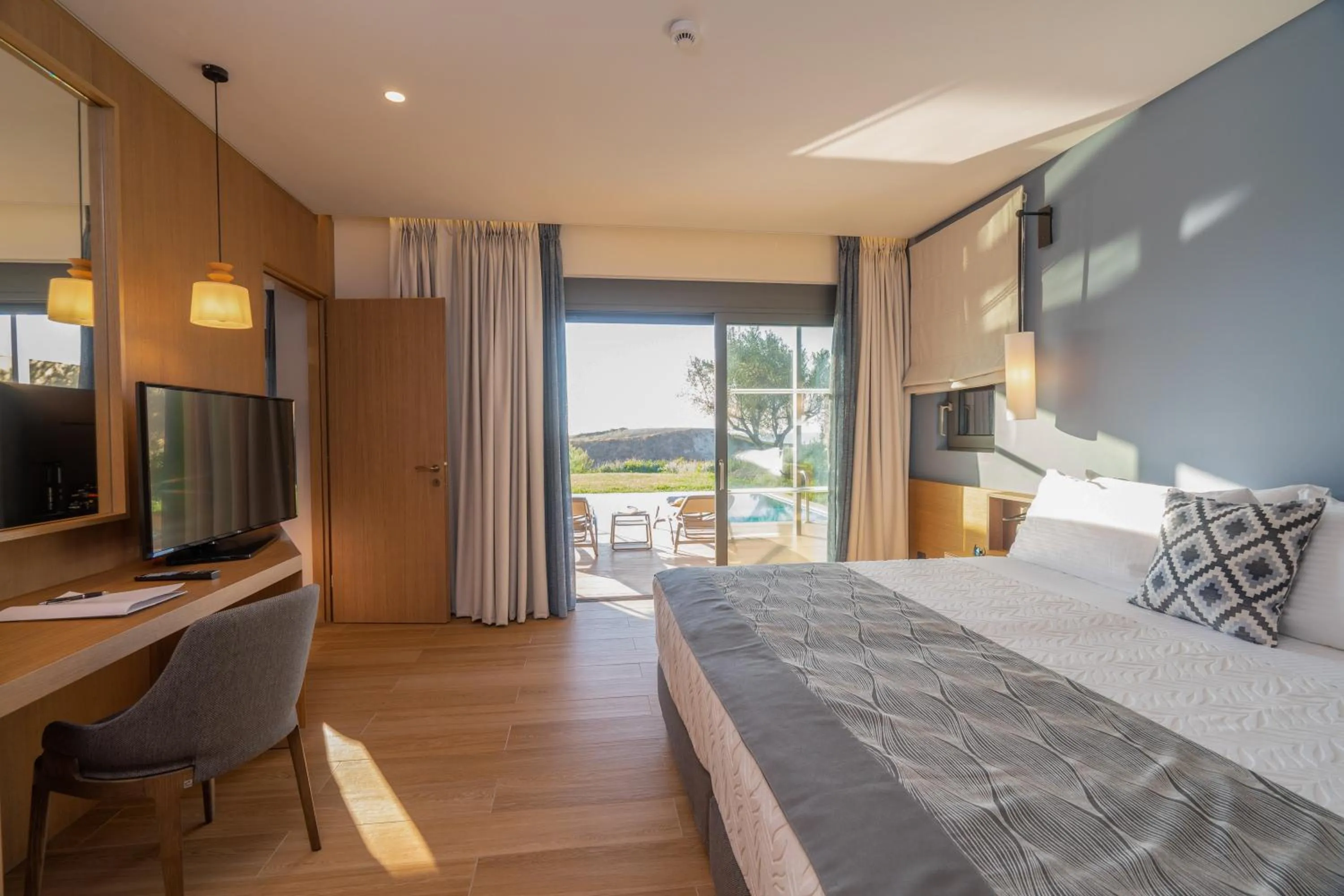 Bedroom, Bed in Apollonion Asterias Resort and Spa