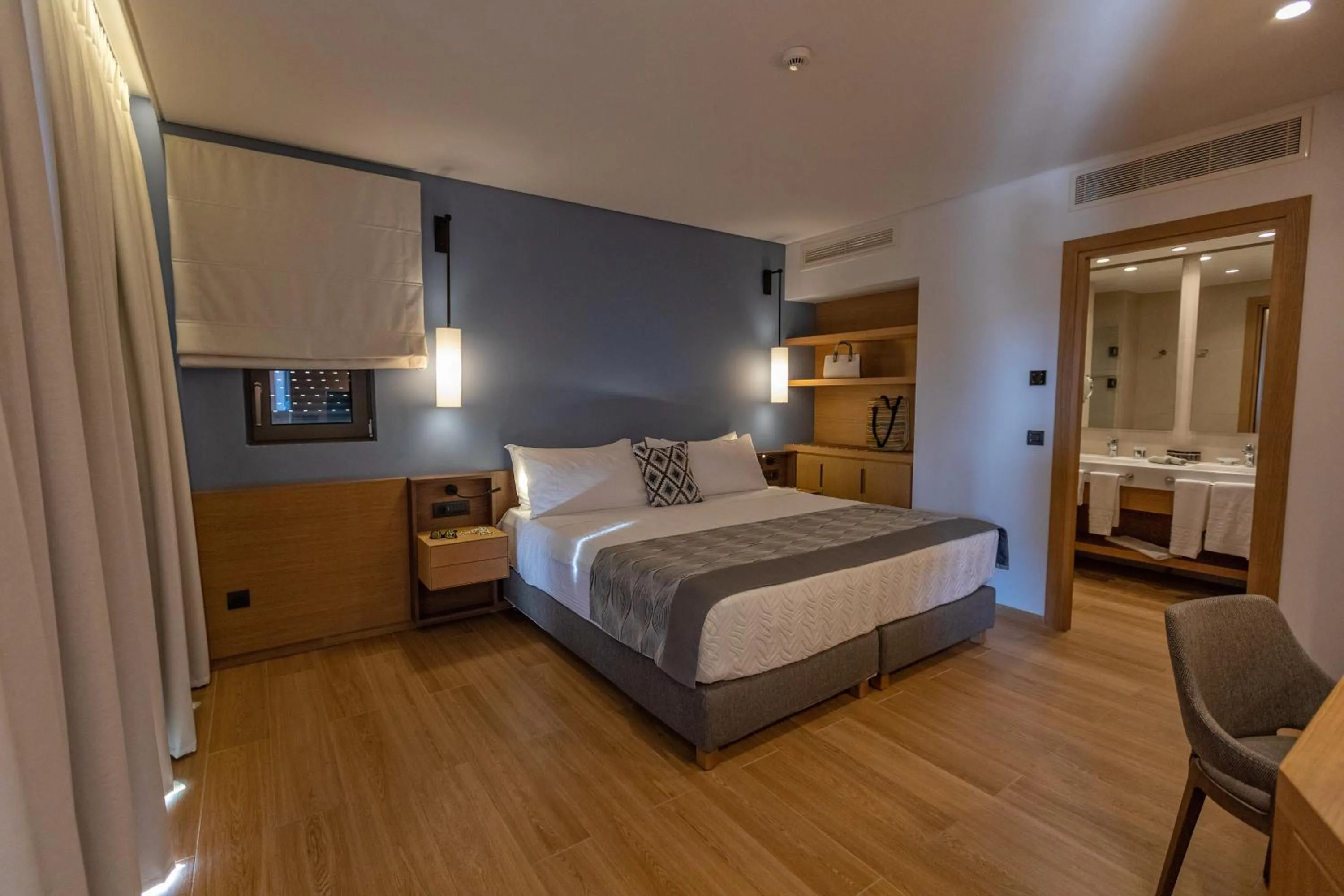 Bedroom, Bed in Apollonion Asterias Resort and Spa