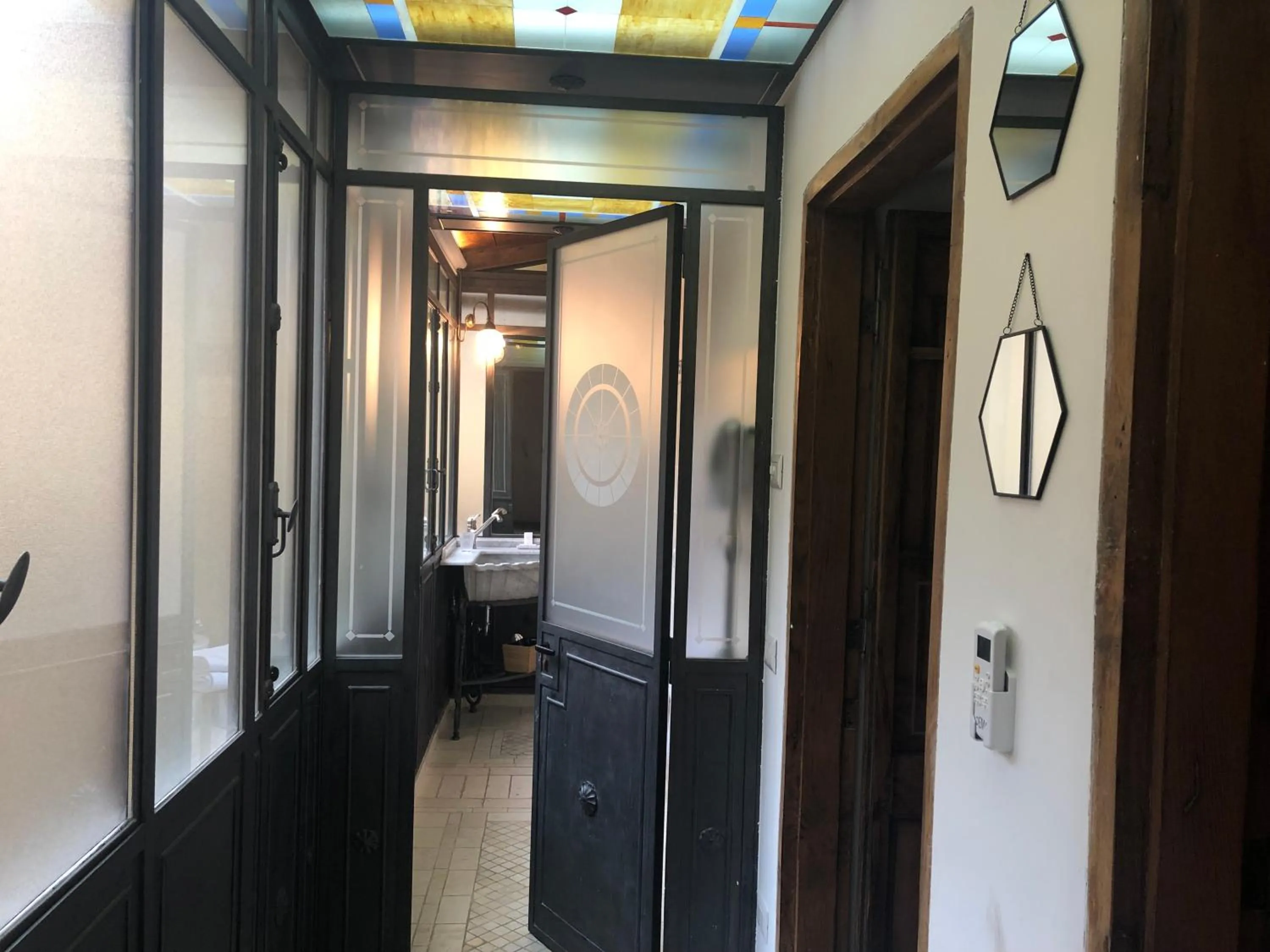 Shower in Giuturna Boutique Hotel